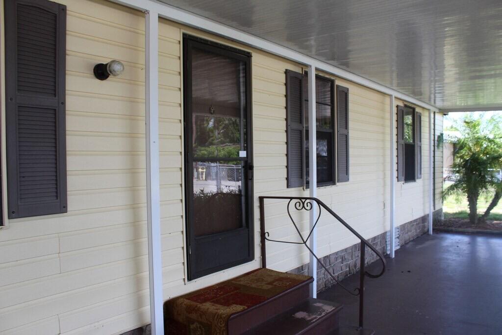 Foto de propiedad en 1163 20th Street, Okeechobee, FL 34974 Okeechobee con MLS# 