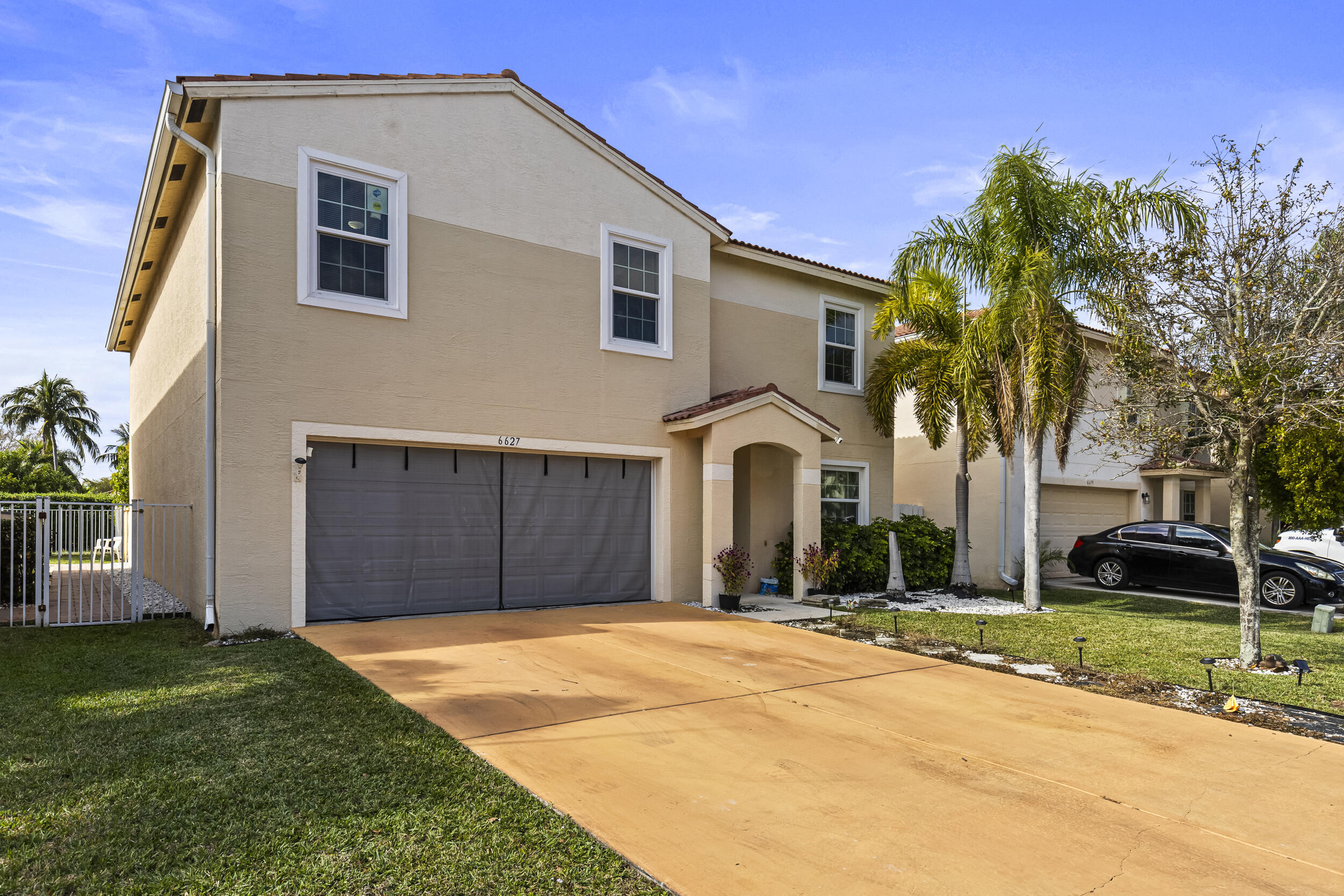 Foto de propiedad en 6627 Rainwood Cove Lane, Lake Worth, FL 33463 Lake Worth con MLS# 