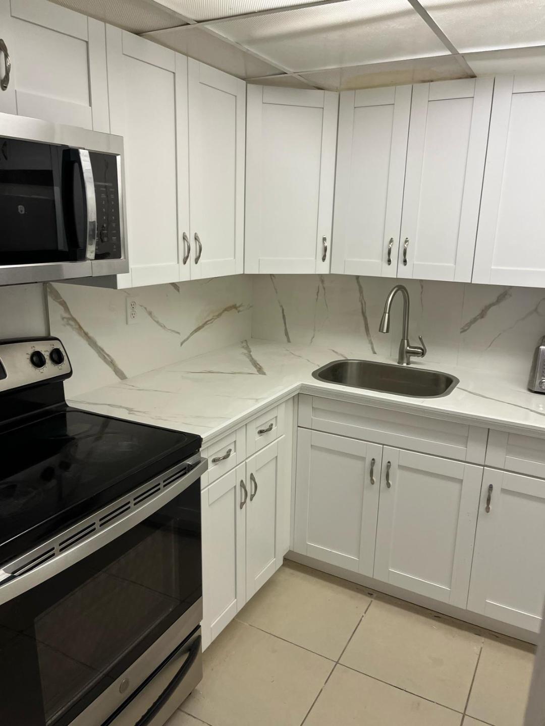 Foto de propiedad en 1758 NW 55th Avenue 102, Lauderhill, FL 33313 Lauderhill con MLS# 