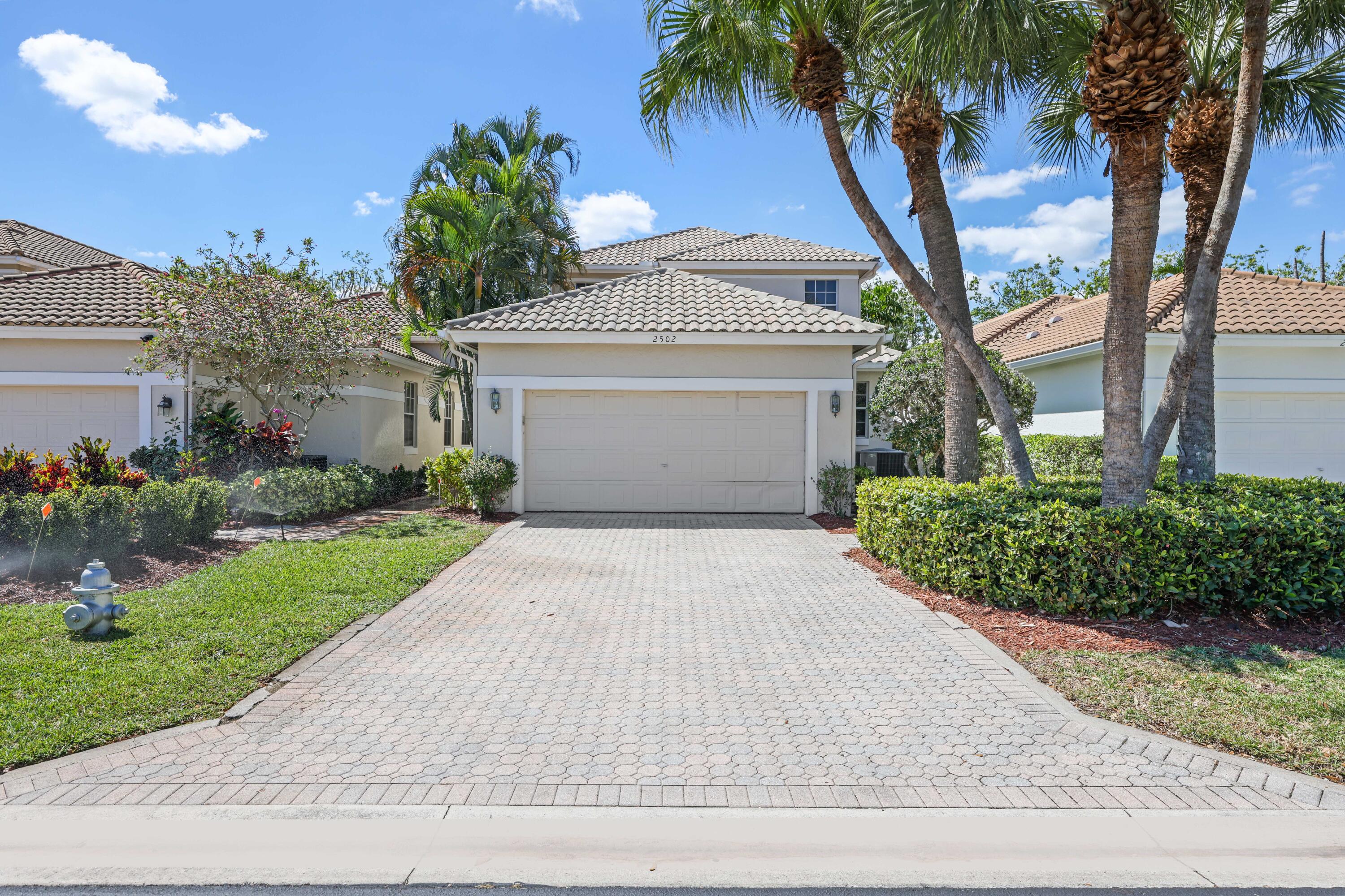 Foto de propiedad en 2502 NW 66th Drive, Boca Raton, FL 33496 Boca Raton con MLS# 