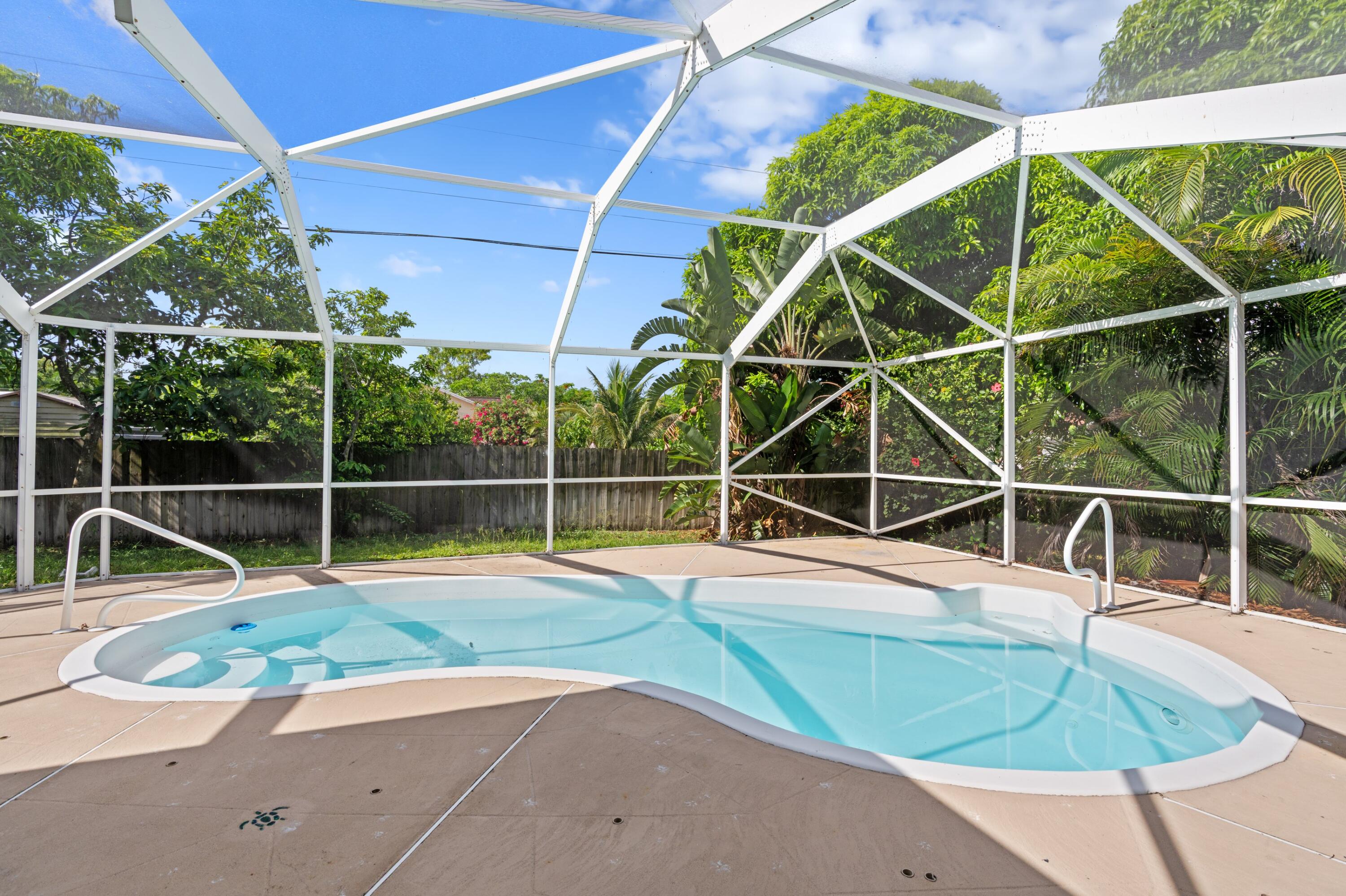 Foto de propiedad en 1042 SW Janette Avenue, Port St. Lucie, FL 34953 Port St. Lucie con MLS# 