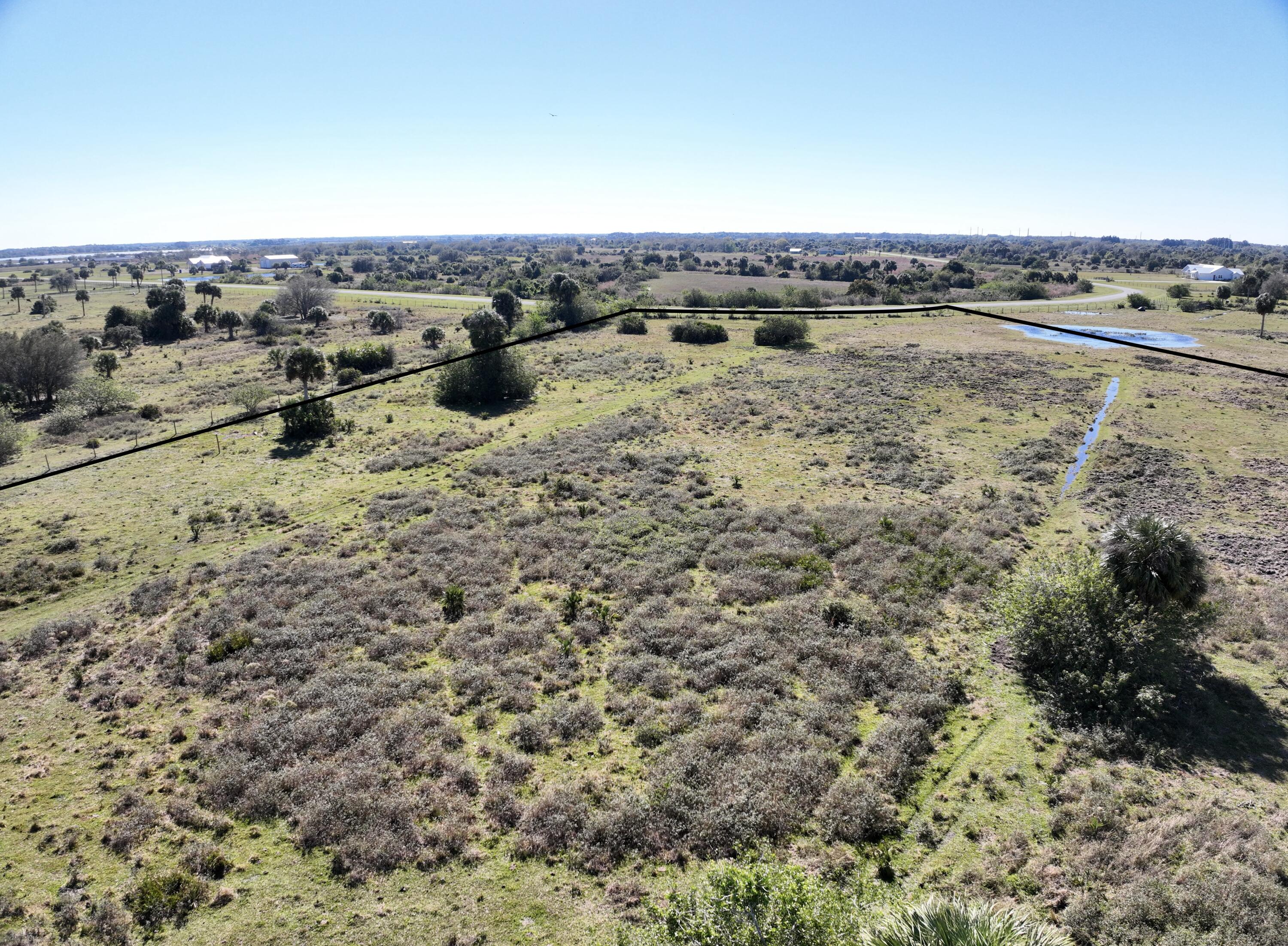 Foto de propiedad en 6572 SE 26th Trail, Okeechobee, FL 34974 Okeechobee con MLS# 