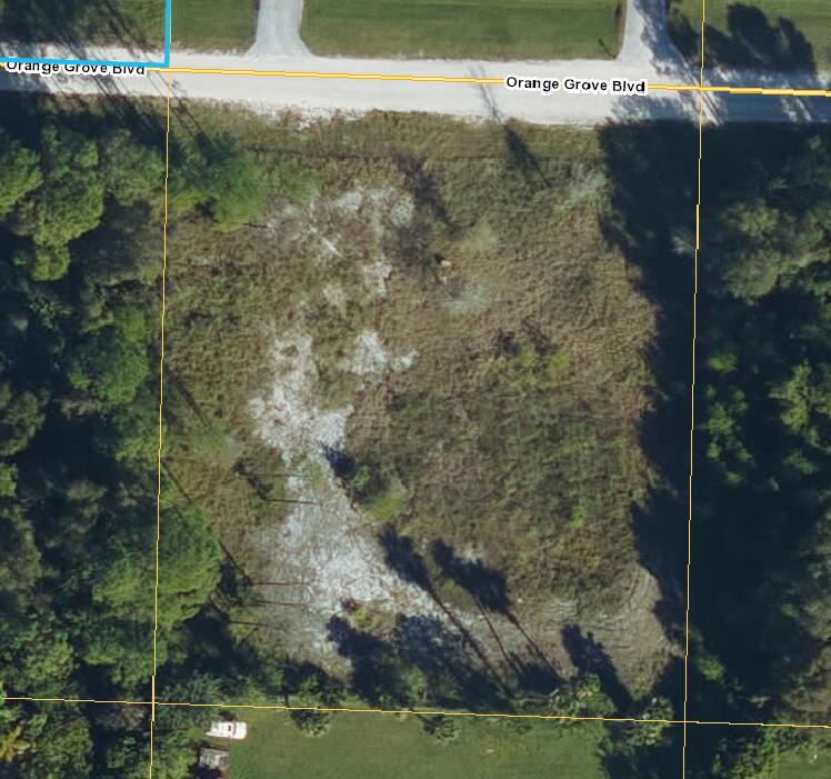 Foto de propiedad en 18056 Orange Grove Boulevard, The Acreage, FL 33470 The Acreage con MLS# 