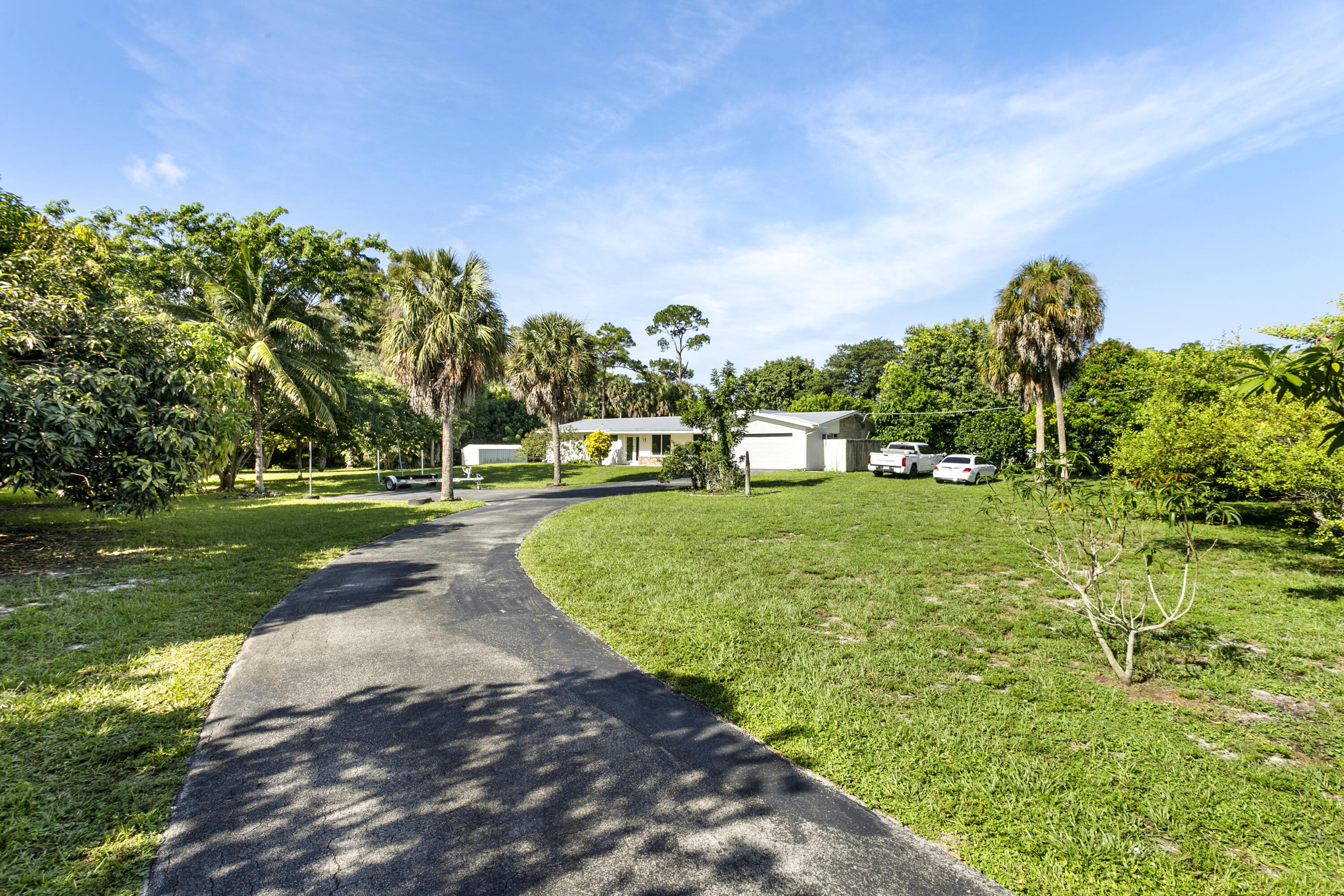 Foto de propiedad en 5200 Club Road, Haverhill, FL 33415 Haverhill con MLS# 