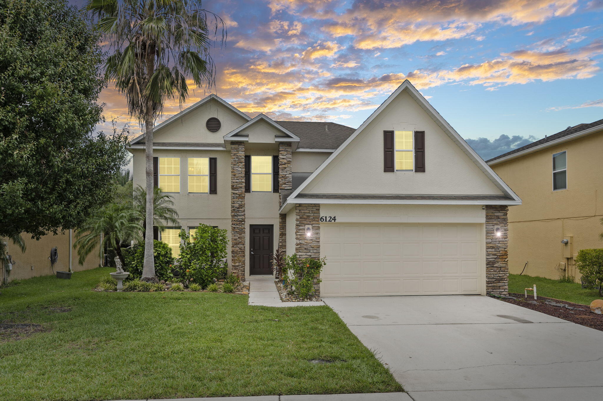 Foto de propiedad en 6124 NW Butterfly Orchid Place, Port St. Lucie, FL 34986 Port St. Lucie con MLS# 