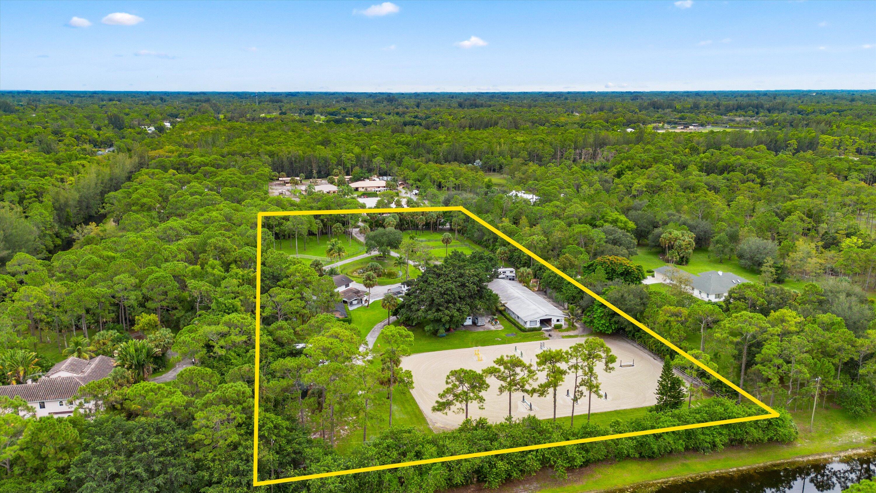 Foto de propiedad en 2915 Doe Trail, The Acreage, FL 33470 The Acreage con MLS# 