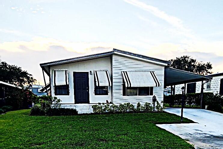 Foto de propiedad en 7781 SE Shenandoah Drive, Hobe Sound, FL 33455 Hobe Sound con MLS# 