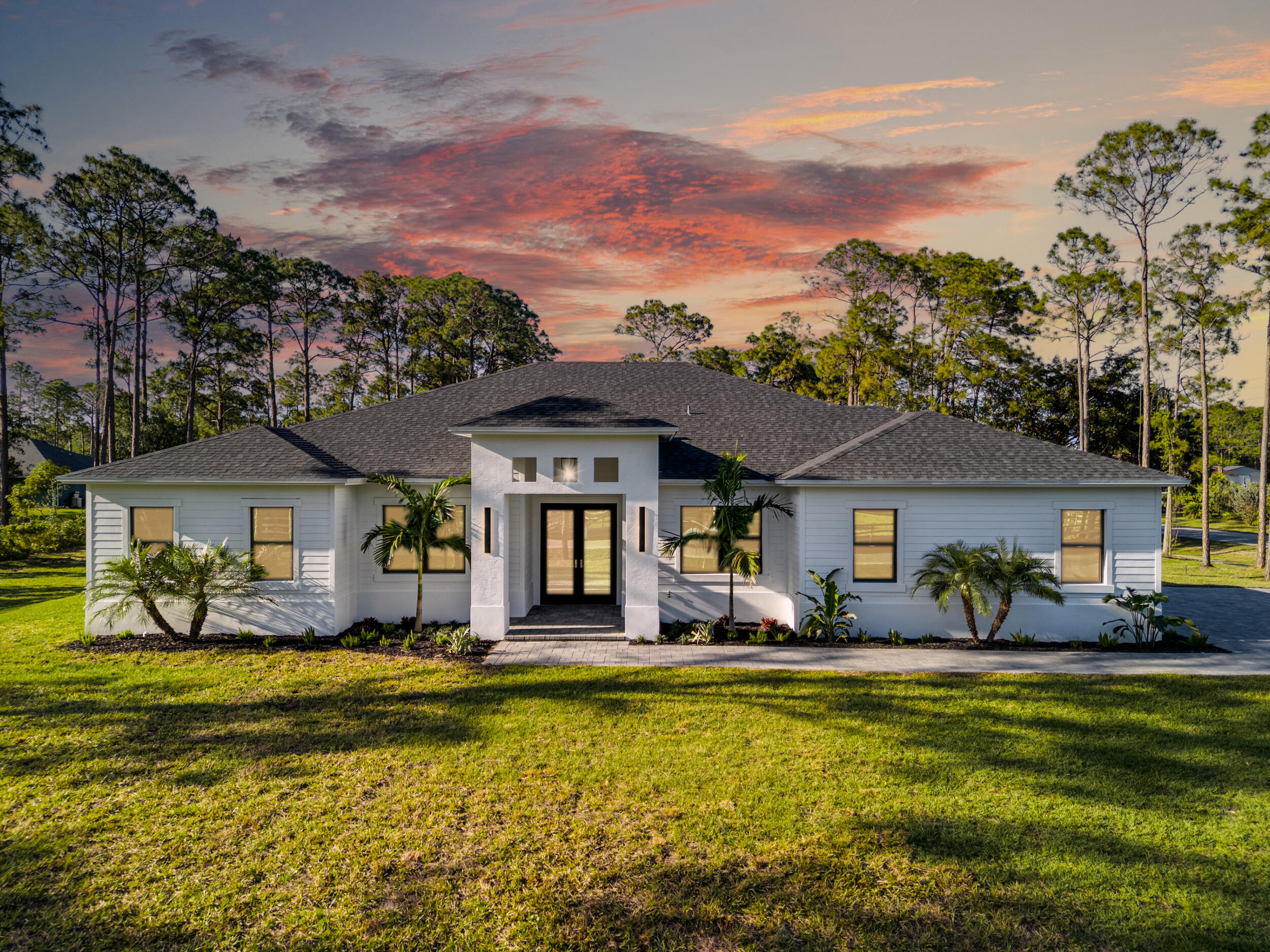 Foto de propiedad en 12879 Key Lime Boulevard, The Acreage, FL 33412 The Acreage con MLS# 