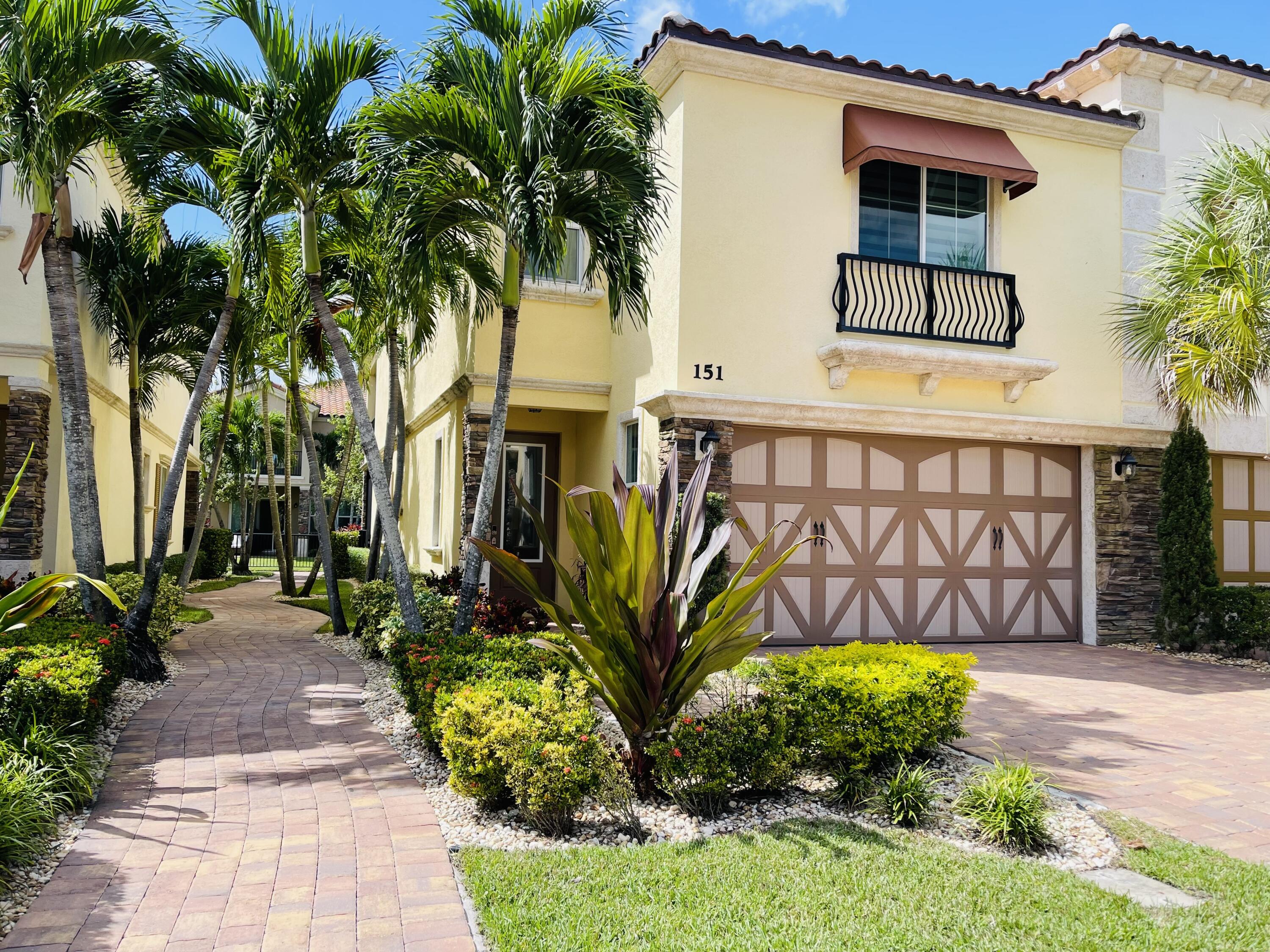 Foto de propiedad en 151 Sword Fern Place, Wellington, FL 33414 Wellington con MLS# 