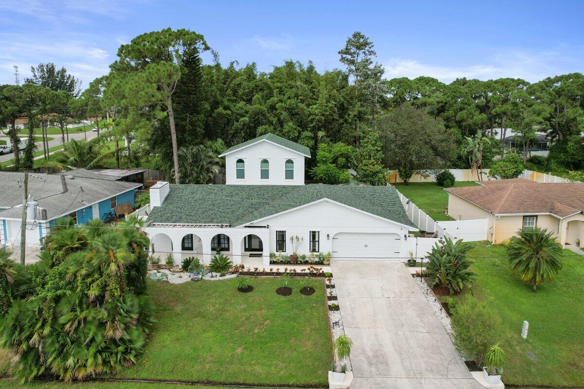 Foto de propiedad en 1992 SW Brisbane Street, Port St. Lucie, FL 34984 Port St. Lucie con MLS# 
