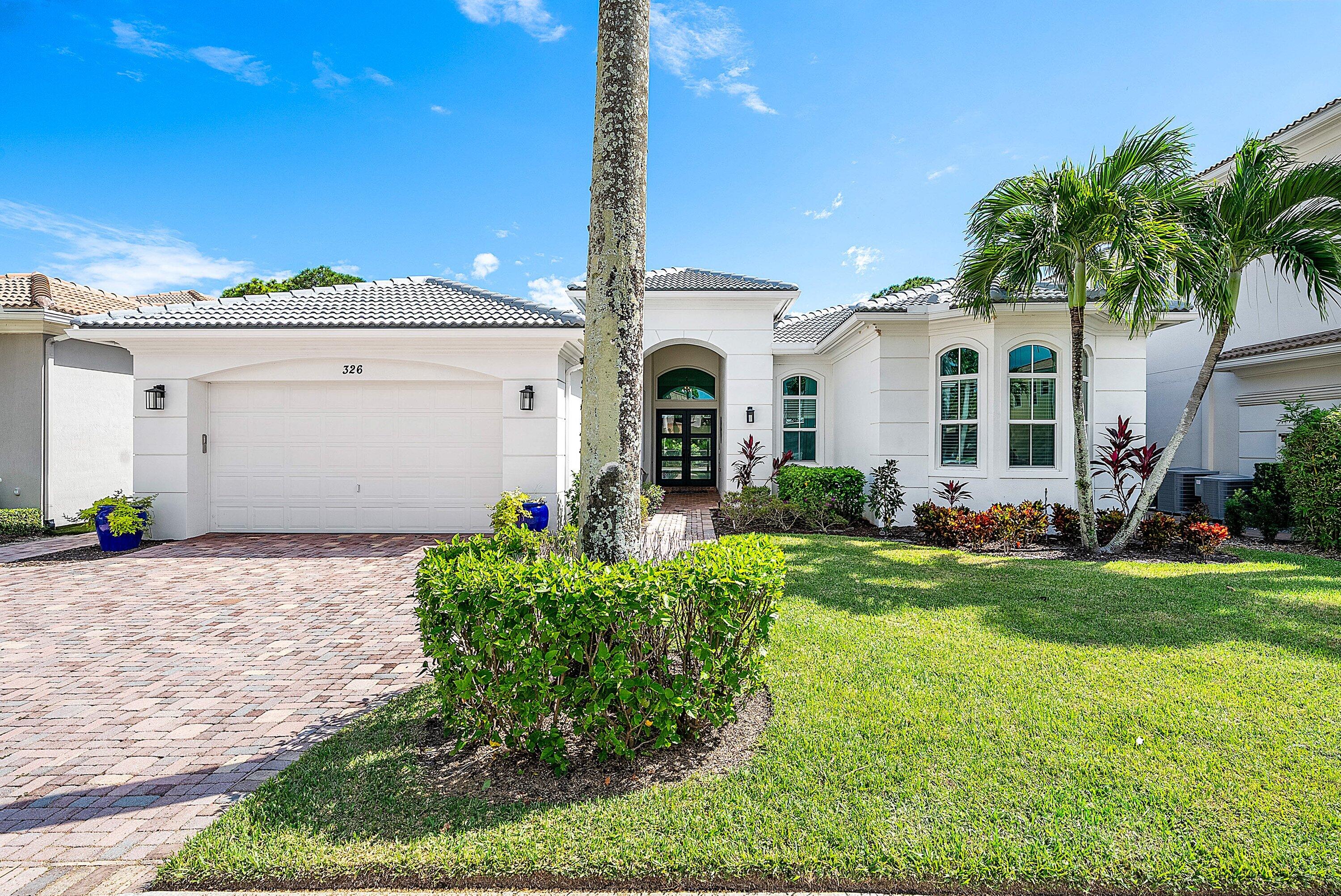Foto de propiedad en 326 Charroux Drive, Palm Beach Gardens, FL 33410 Palm Beach Gardens con MLS# 