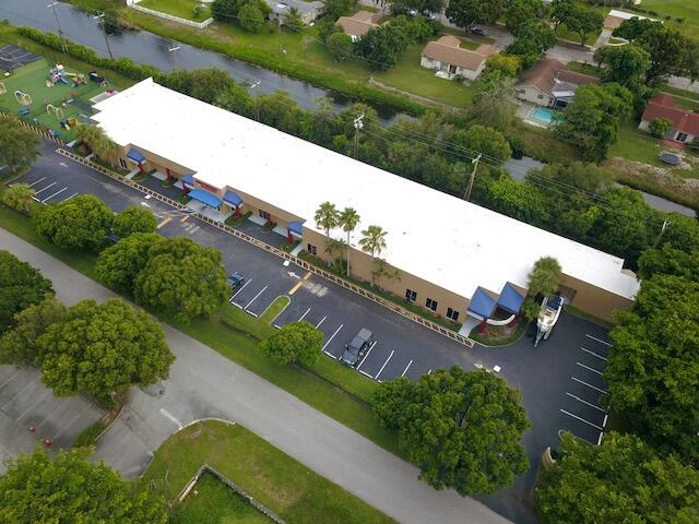 Foto de propiedad en 4480 S Tiffany Drive, Mangonia Park, FL 33407 Mangonia Park con MLS# 