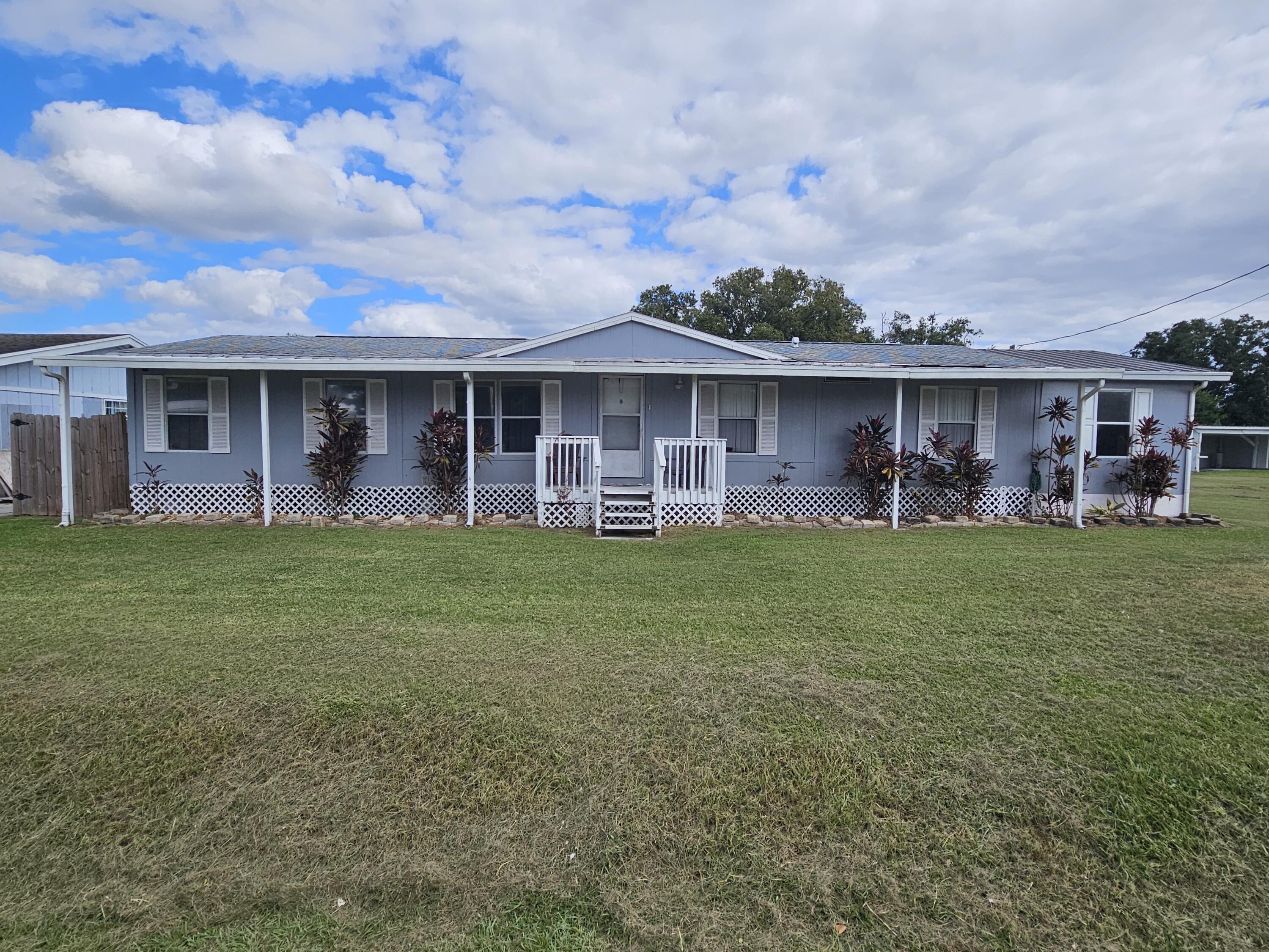 Foto de propiedad en 3222 SE 34th Avenue, Okeechobee, FL 34974 Okeechobee con MLS# 