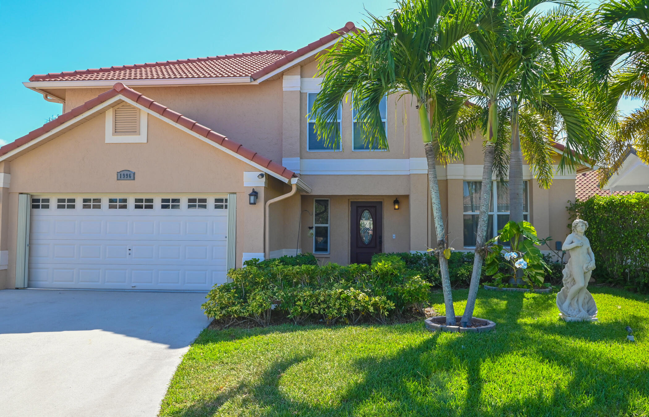 Foto de propiedad en 1996 Lake Breeze Court, Wellington, FL 33414 Wellington con MLS# 