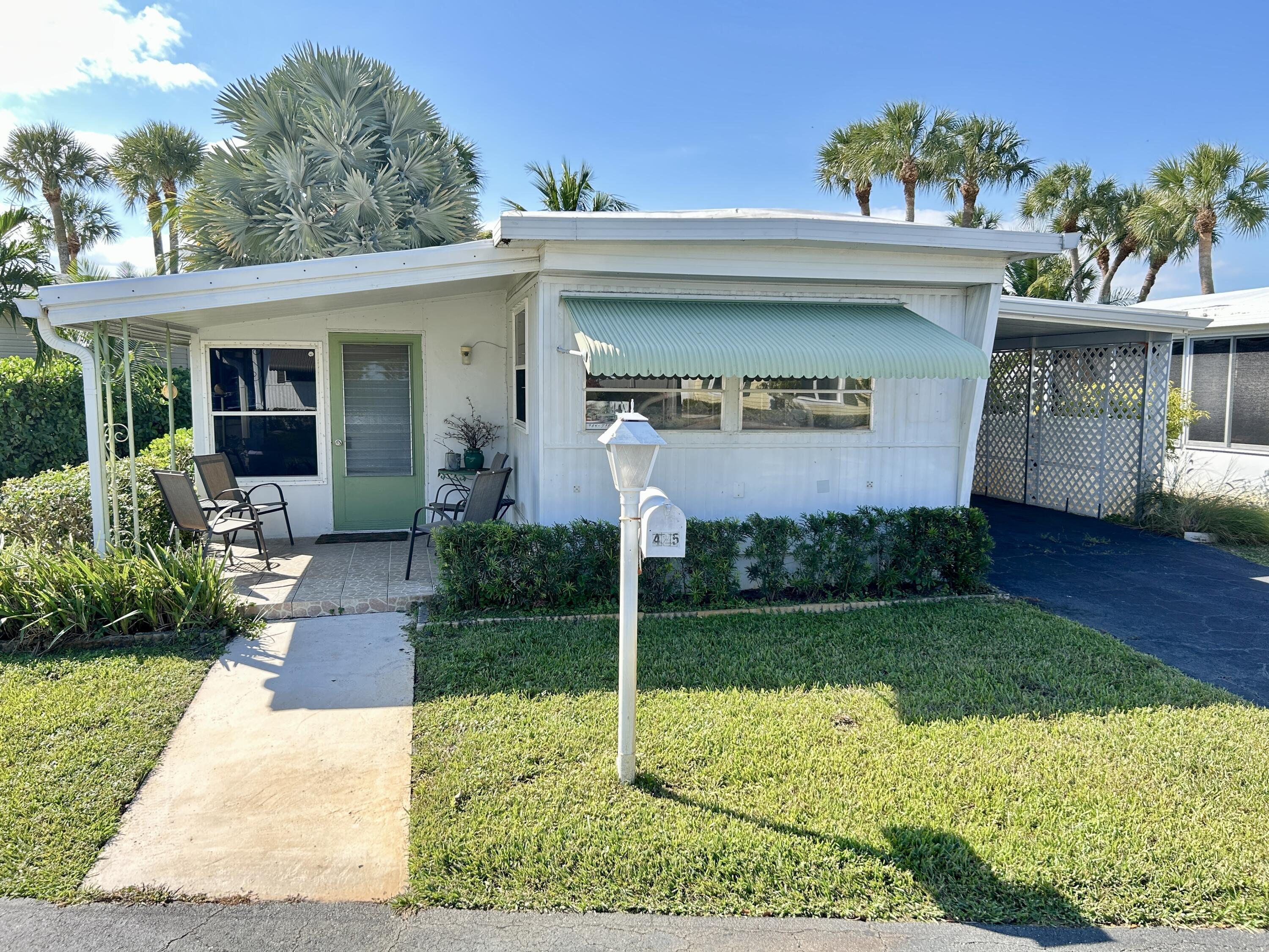 Foto de propiedad en 425 E Bougainvillea Drive, Deerfield Beach, FL 33442 Deerfield Beach con MLS# 