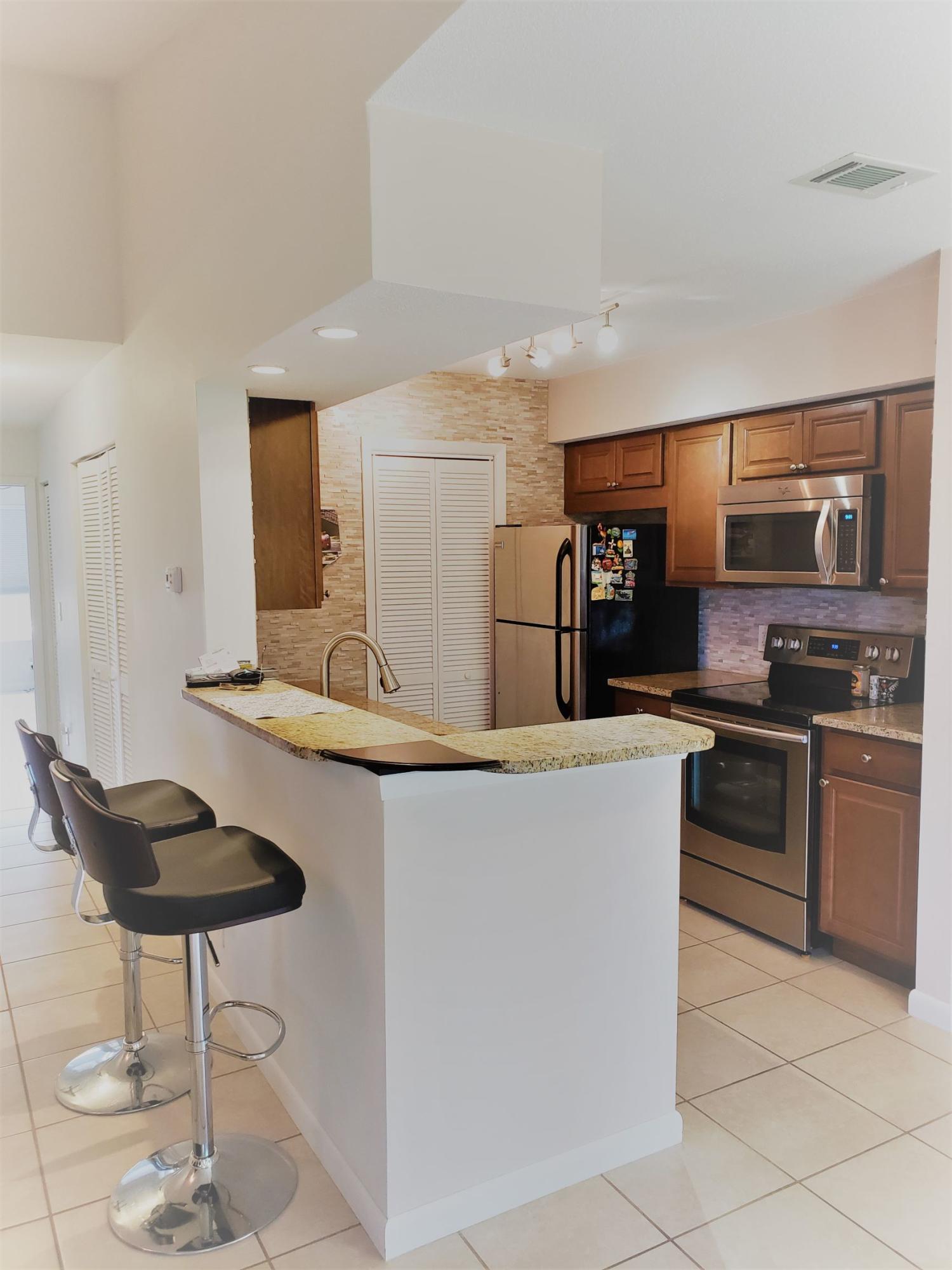 Foto de propiedad en 815 W Boynton Beach Boulevard 15-204, Boynton Beach, FL 33426 Boynton Beach con MLS# 