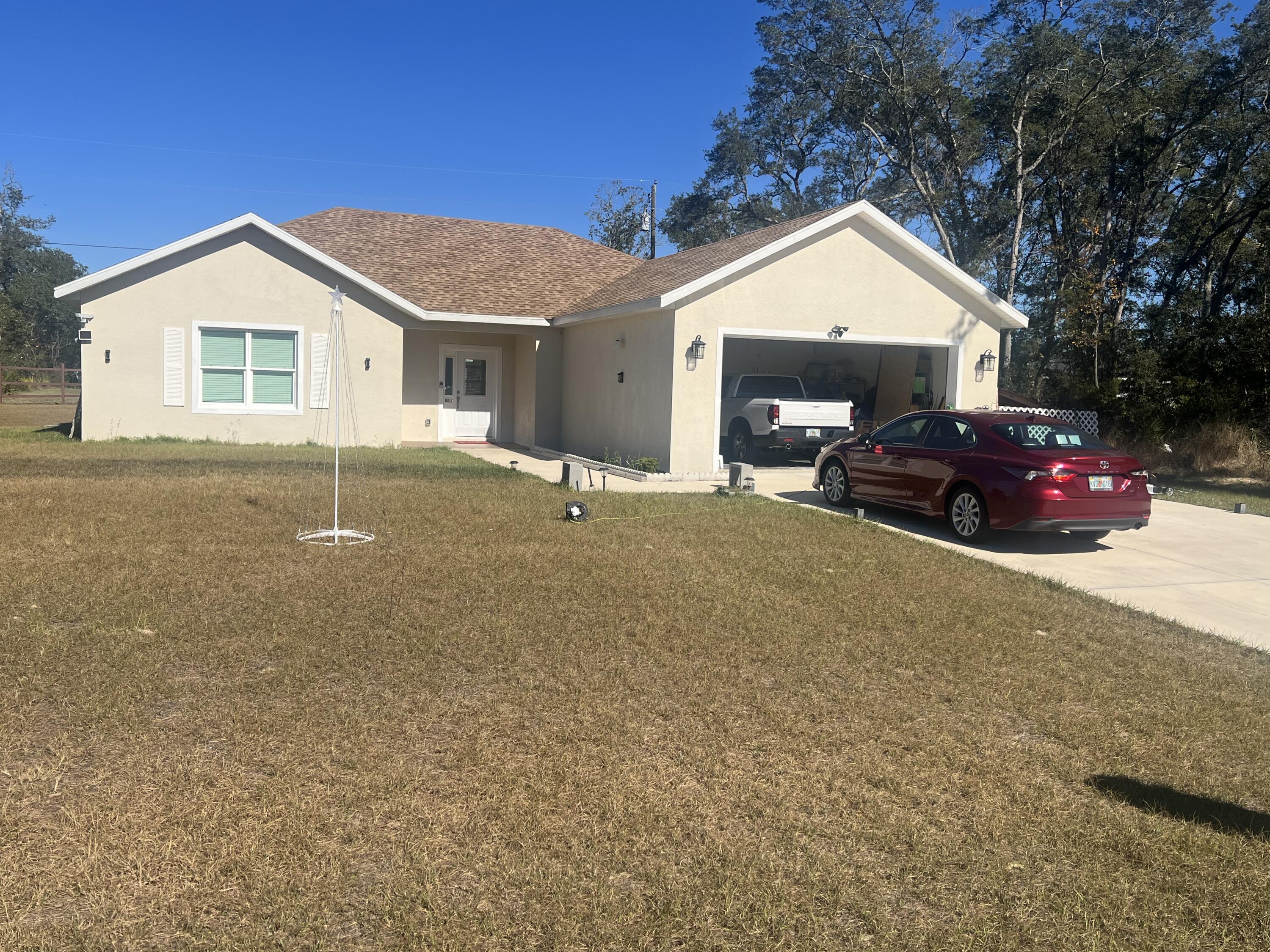 Foto de propiedad en 4009 SW 133rd Loop, Ocala, FL 34473 Ocala con MLS# 
