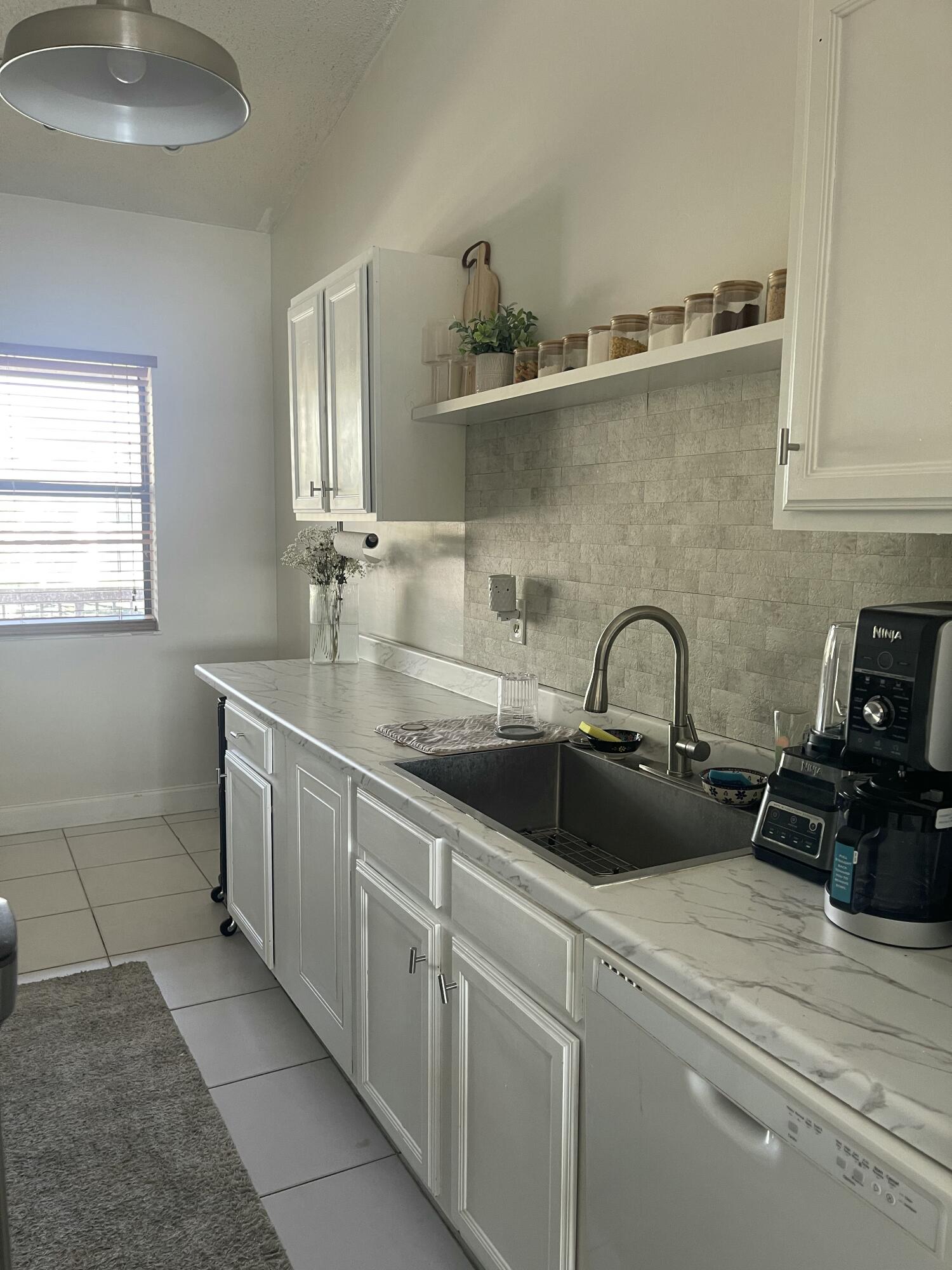 Foto de propiedad en 9878 Nob Hill Court 9878, Sunrise, FL 33351 Sunrise con MLS# 