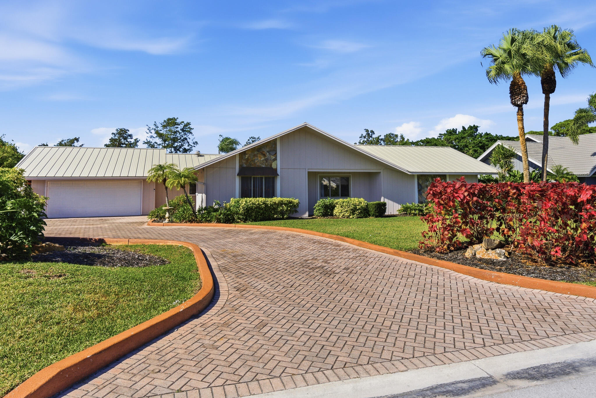 Foto de propiedad en 5151 SE Burning Tree Circle, Stuart, FL 34997 Stuart con MLS# 