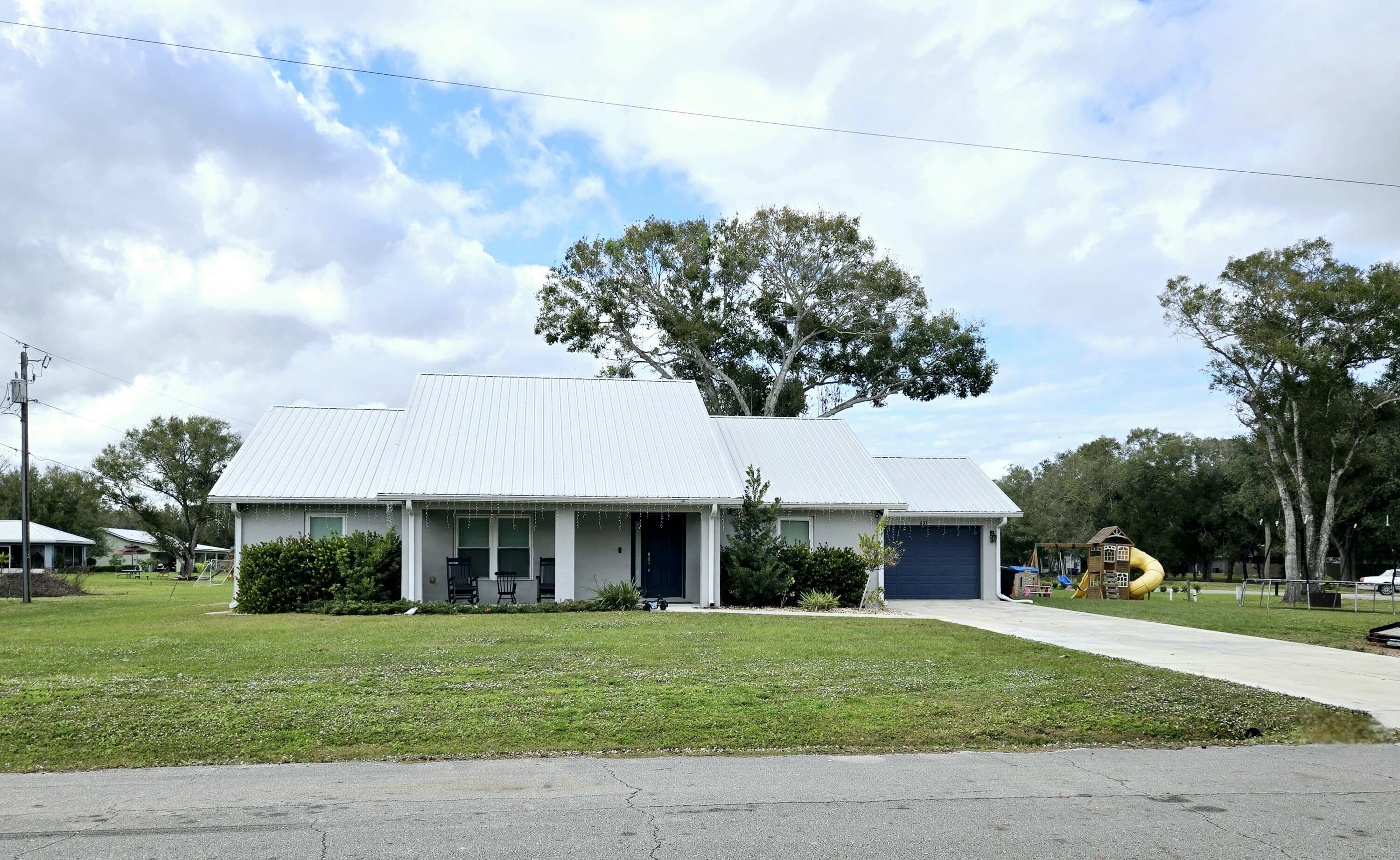 Foto de propiedad en 603 NW 11th Avenue, Okeechobee, FL 34972 Okeechobee con MLS# 