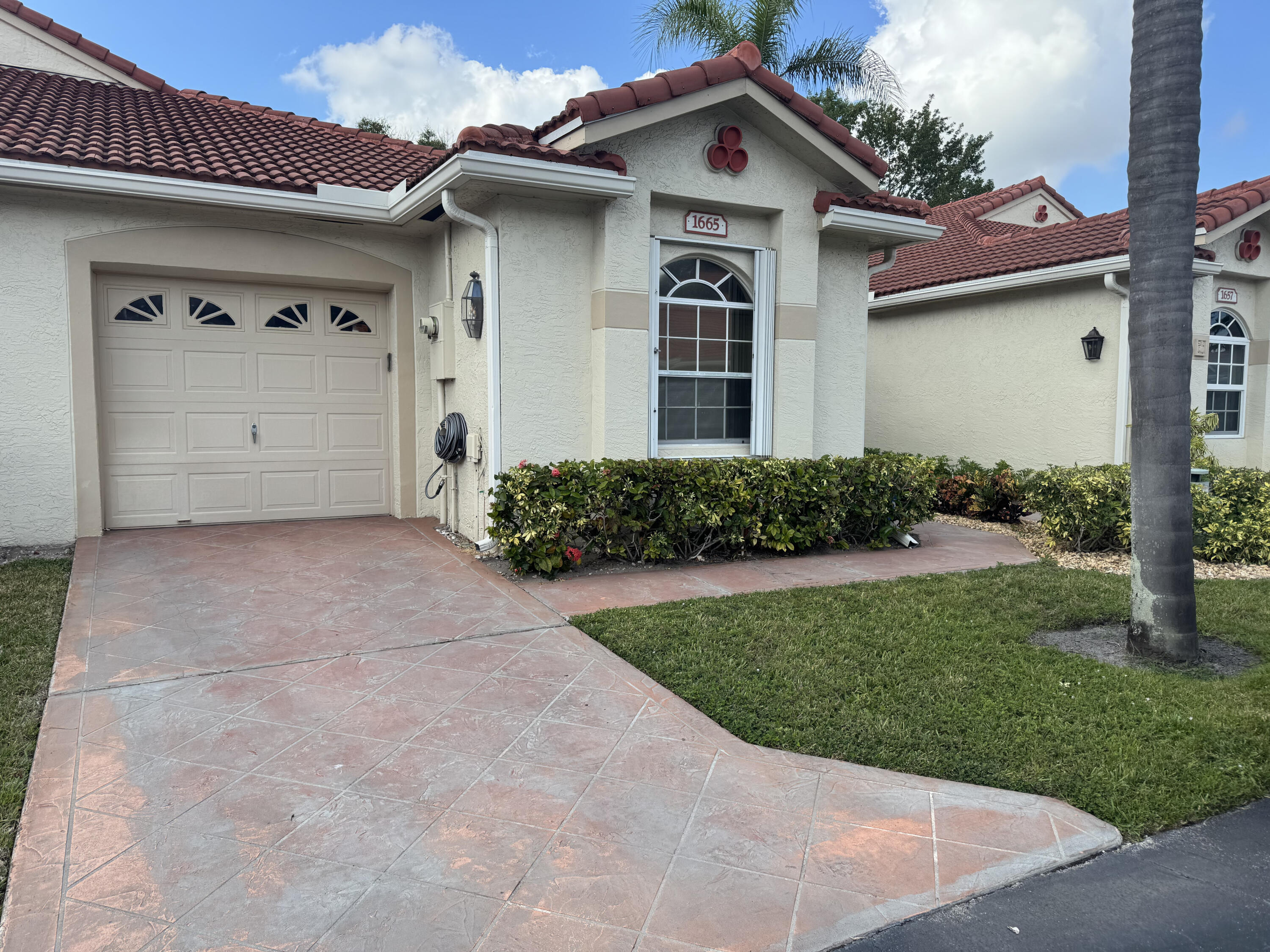 Foto de propiedad en 1665 Wood Fern Drive, Boynton Beach, FL 33436 Boynton Beach con MLS# 