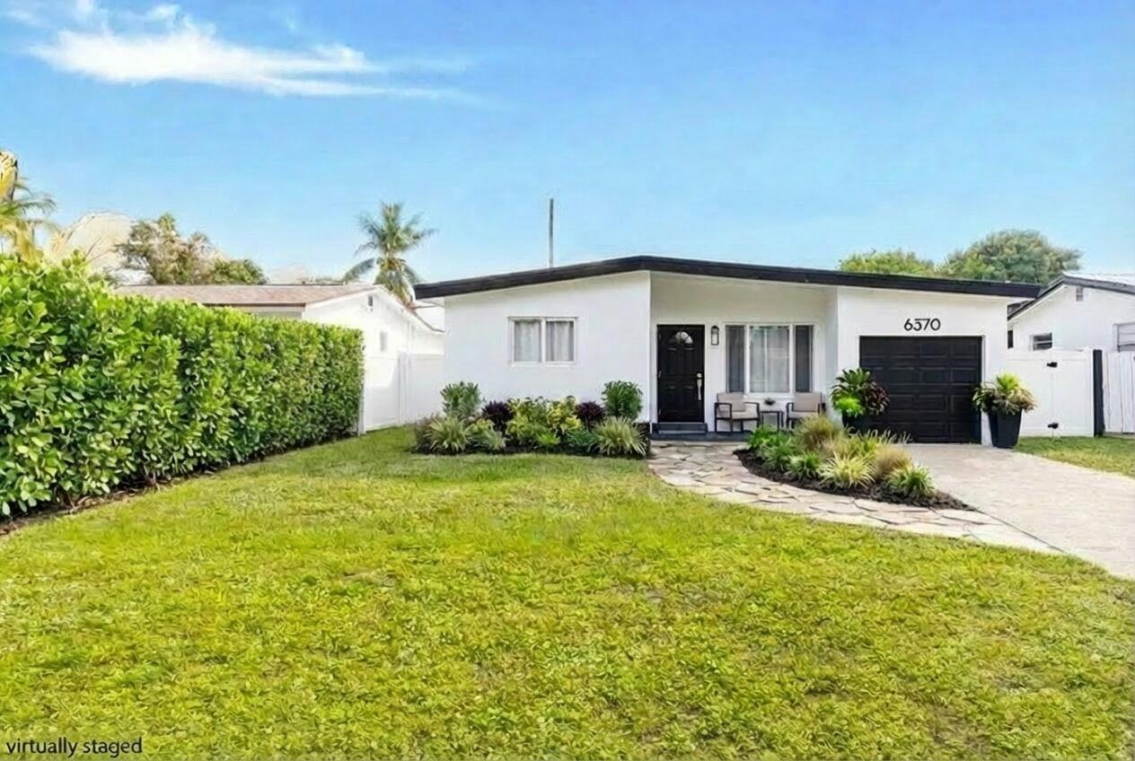 Foto de propiedad en 6370 Plunkett Street, Hollywood, FL 33023 Hollywood con MLS# 