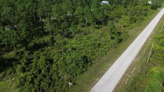 Foto de propiedad en 1115 Chiefland Street E, Lehigh Acres, FL 33974 Lehigh Acres con MLS# 