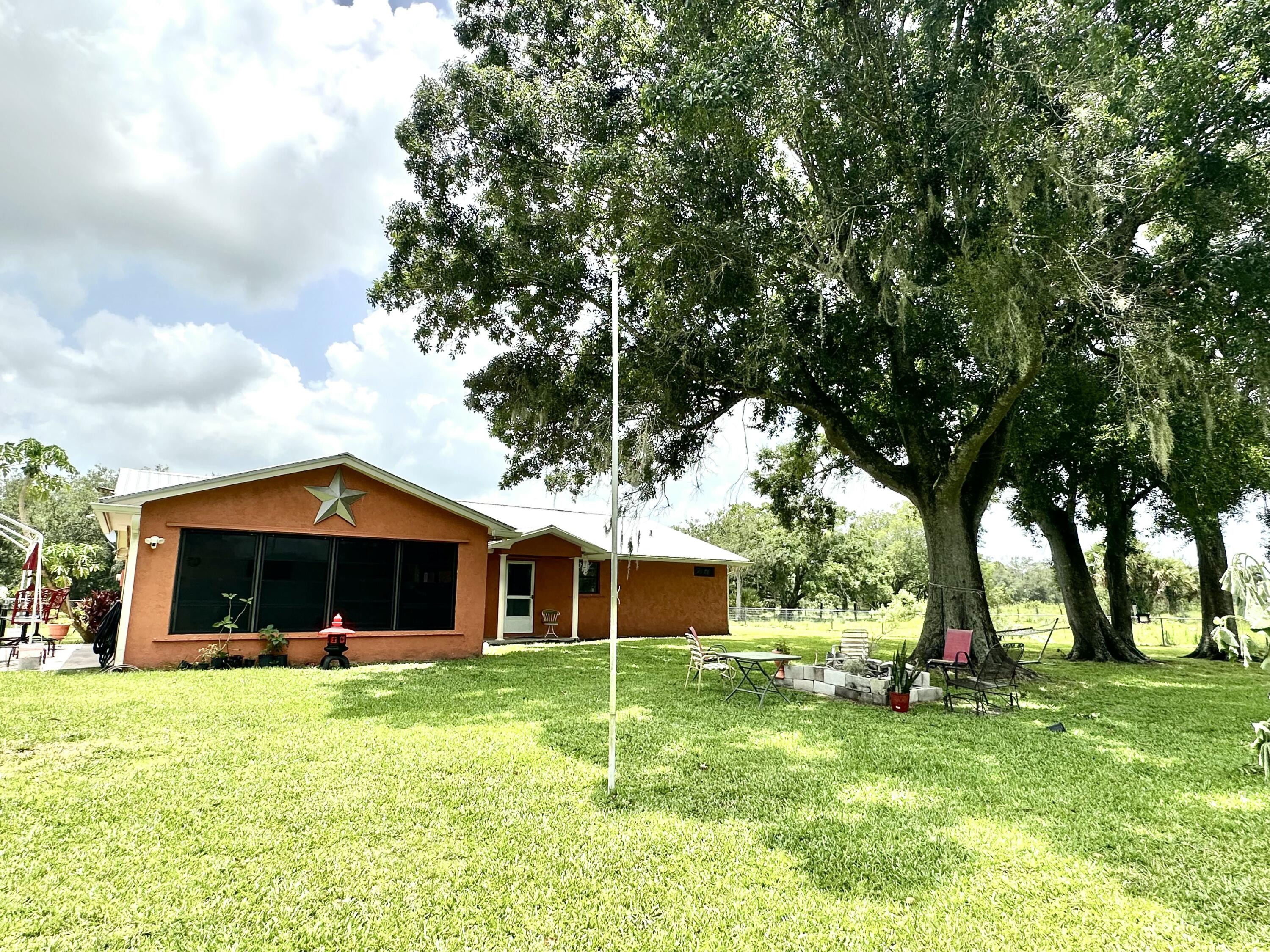 Foto de propiedad en 840 NW 141st Street, Okeechobee, FL 34972 Okeechobee con MLS# 