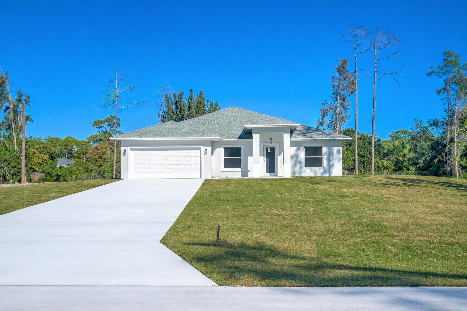 Foto de propiedad en 13875 63rd Lane N, The Acreage, FL 33470 The Acreage con MLS# 