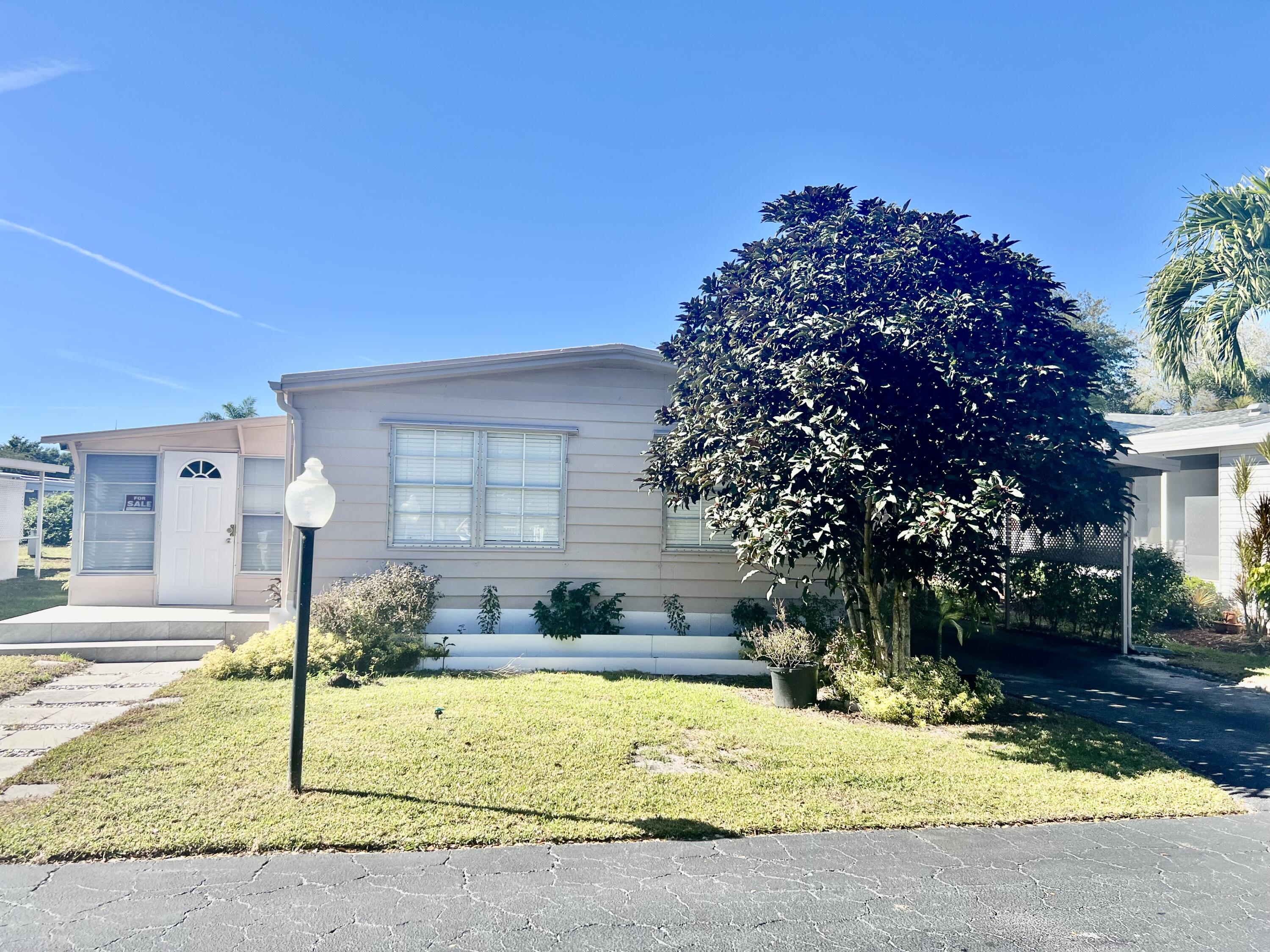 Foto de propiedad en 6741 NW 44th Way Lot T-11, Coconut Creek, FL 33073 Coconut Creek con MLS# 