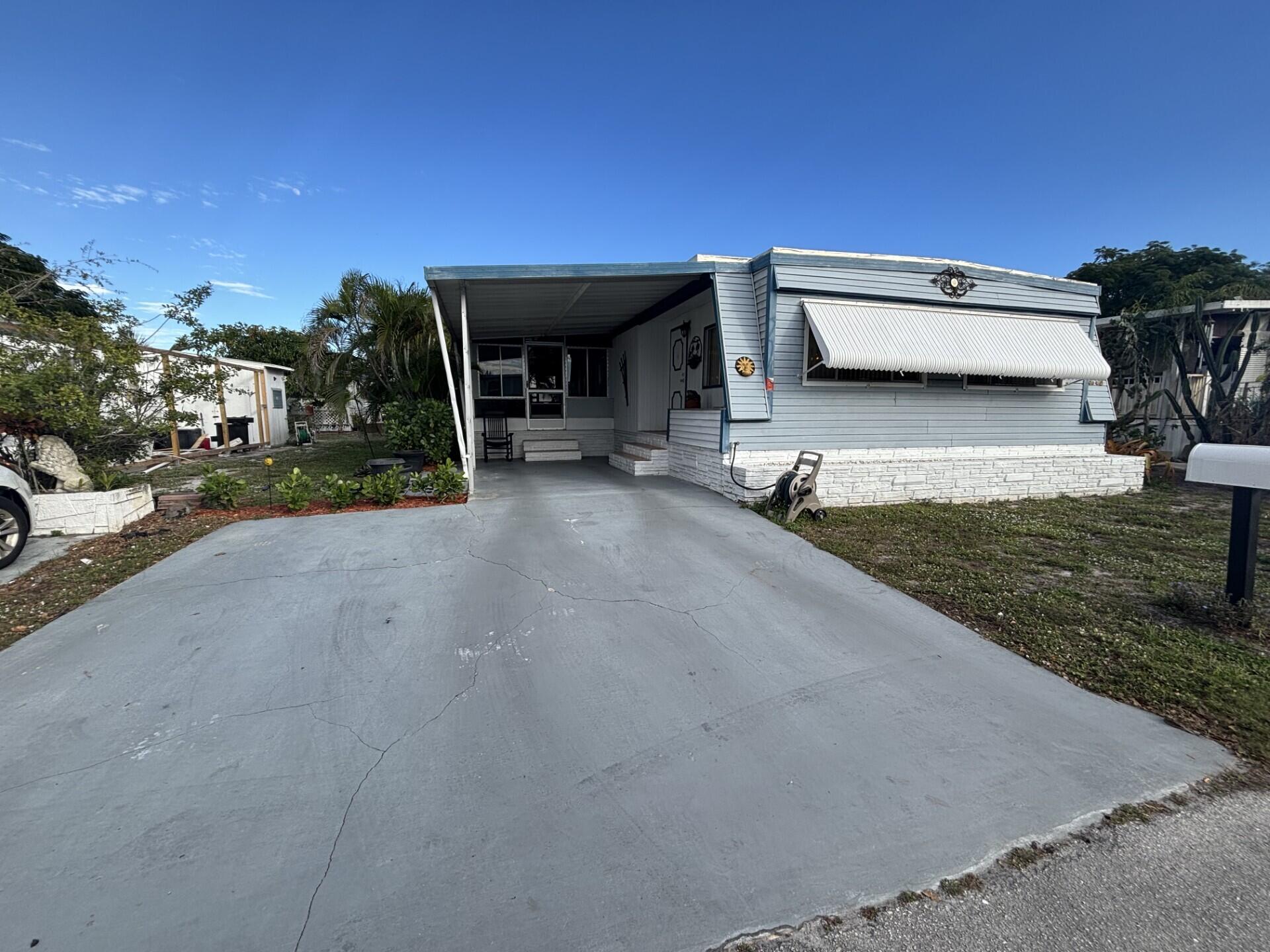 Foto de propiedad en 4912 NW 3rd Ave, Lot 940, Deerfield Beach, FL 33064 Deerfield Beach con MLS# 