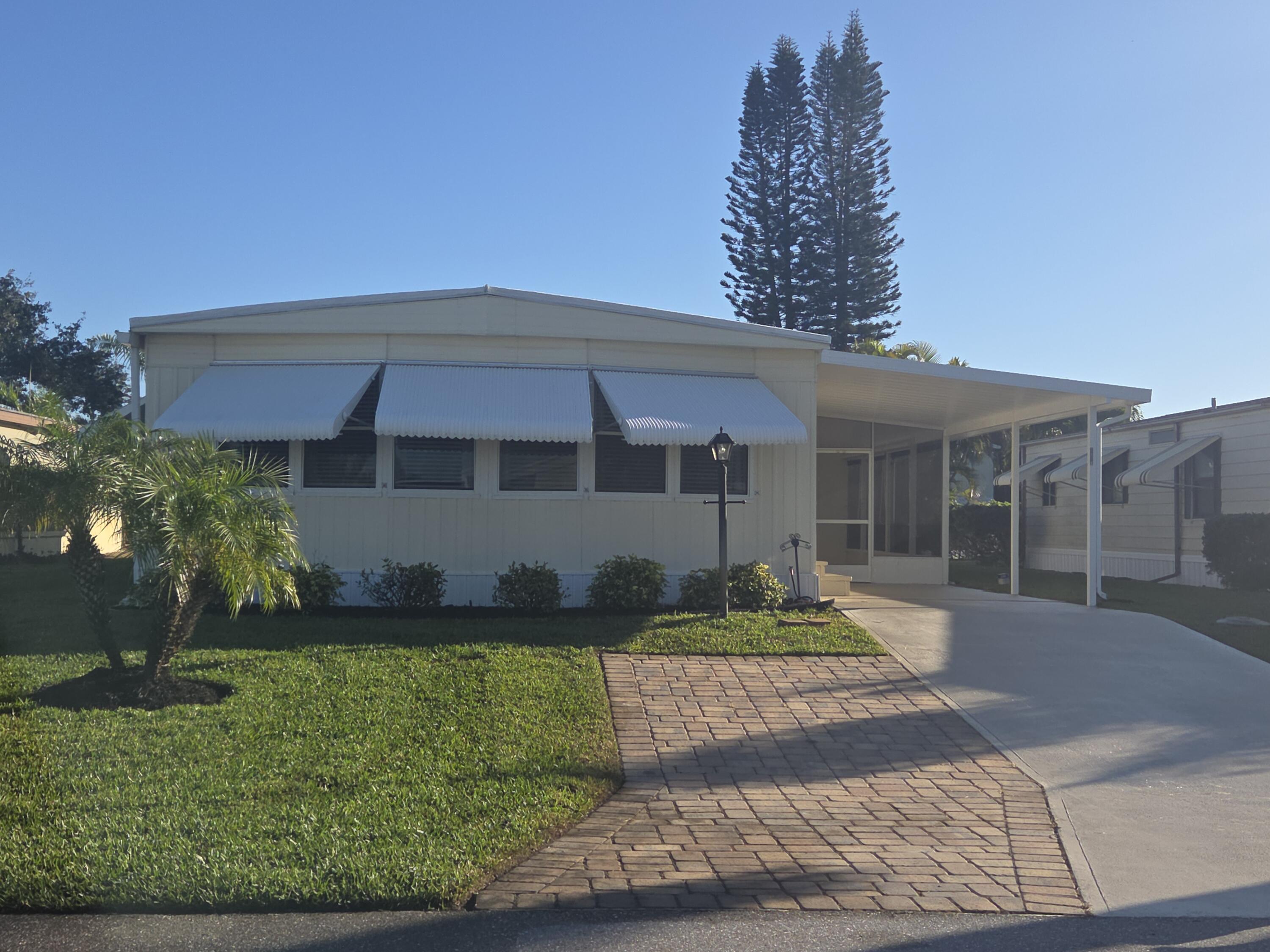 Foto de propiedad en 7871 SE Shenandoah Drive, Hobe Sound, FL 33455 Hobe Sound con MLS# 