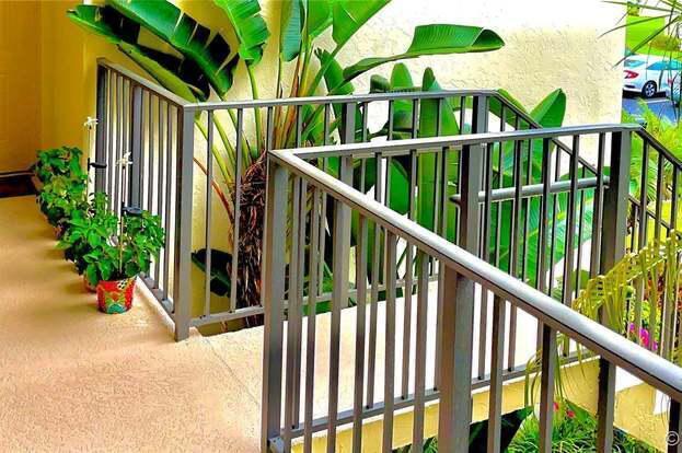 Foto de propiedad en 1561 Windorah Way F, West Palm Beach, FL 33411 West Palm Beach con MLS# 