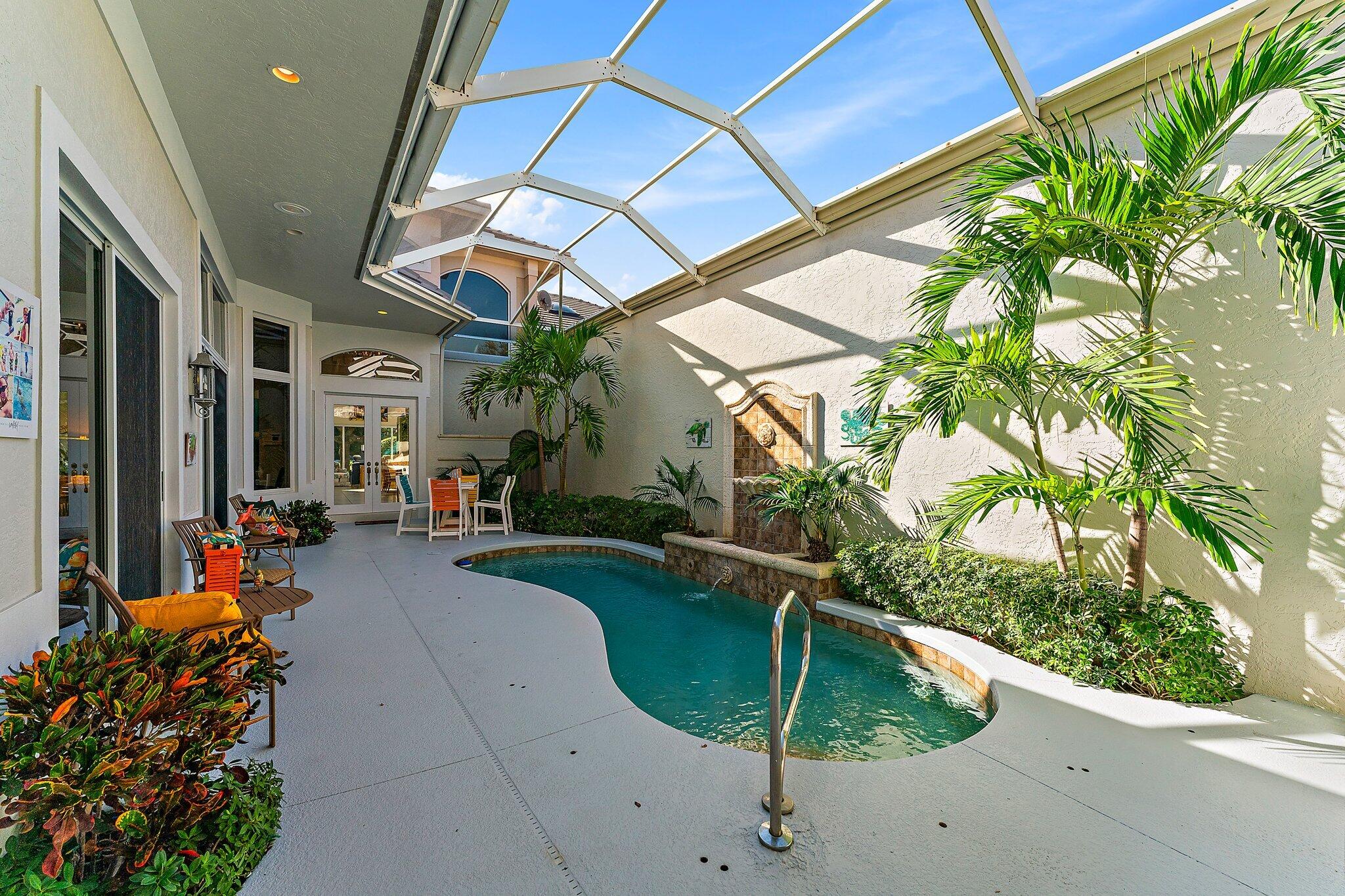 Foto de propiedad en 12020 SE Birkdale Run, Jupiter, FL 33469 Jupiter con MLS# 