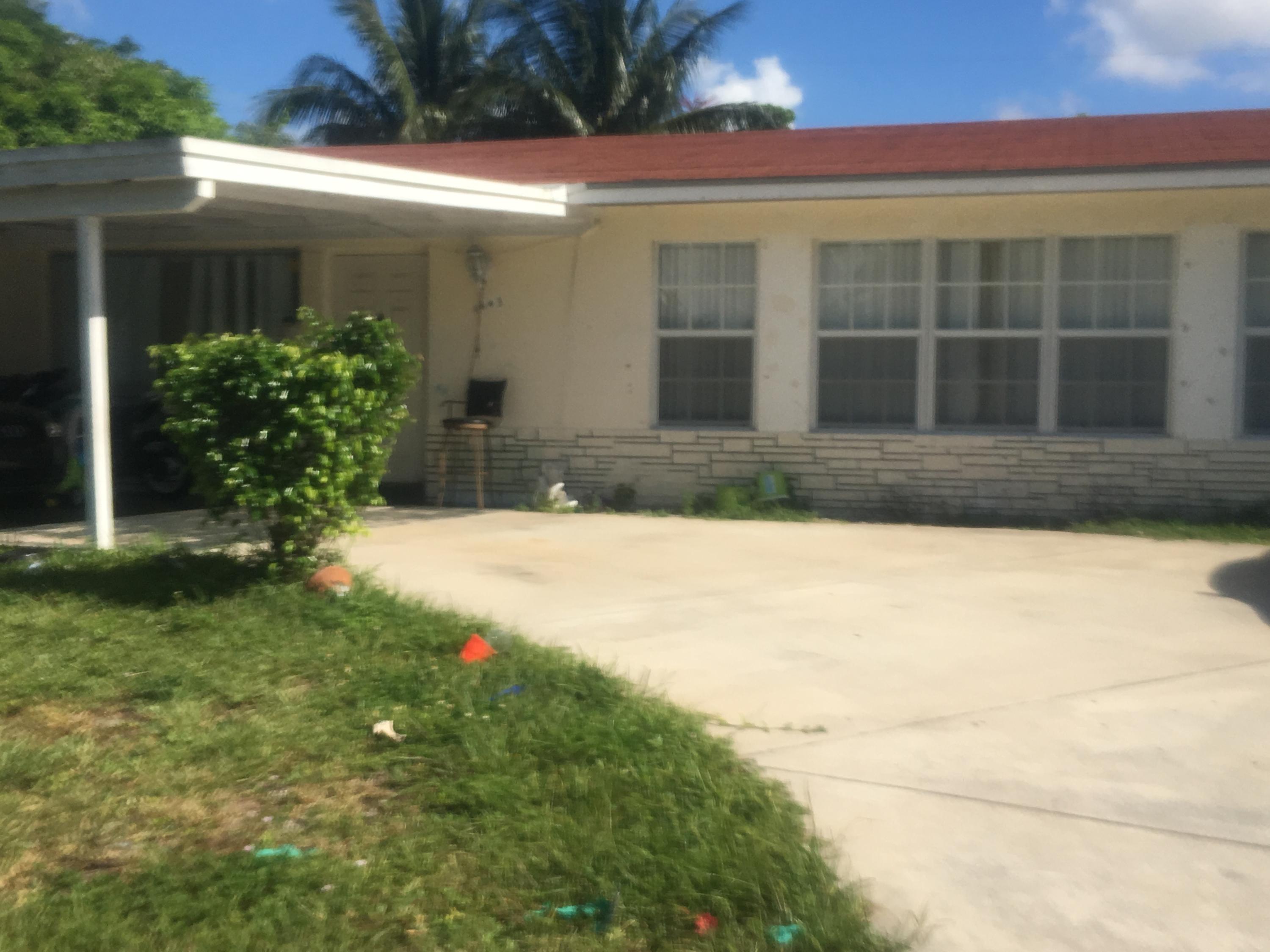Foto de propiedad en 1643 44th Street, West Palm Beach, FL 33407 West Palm Beach con MLS# 