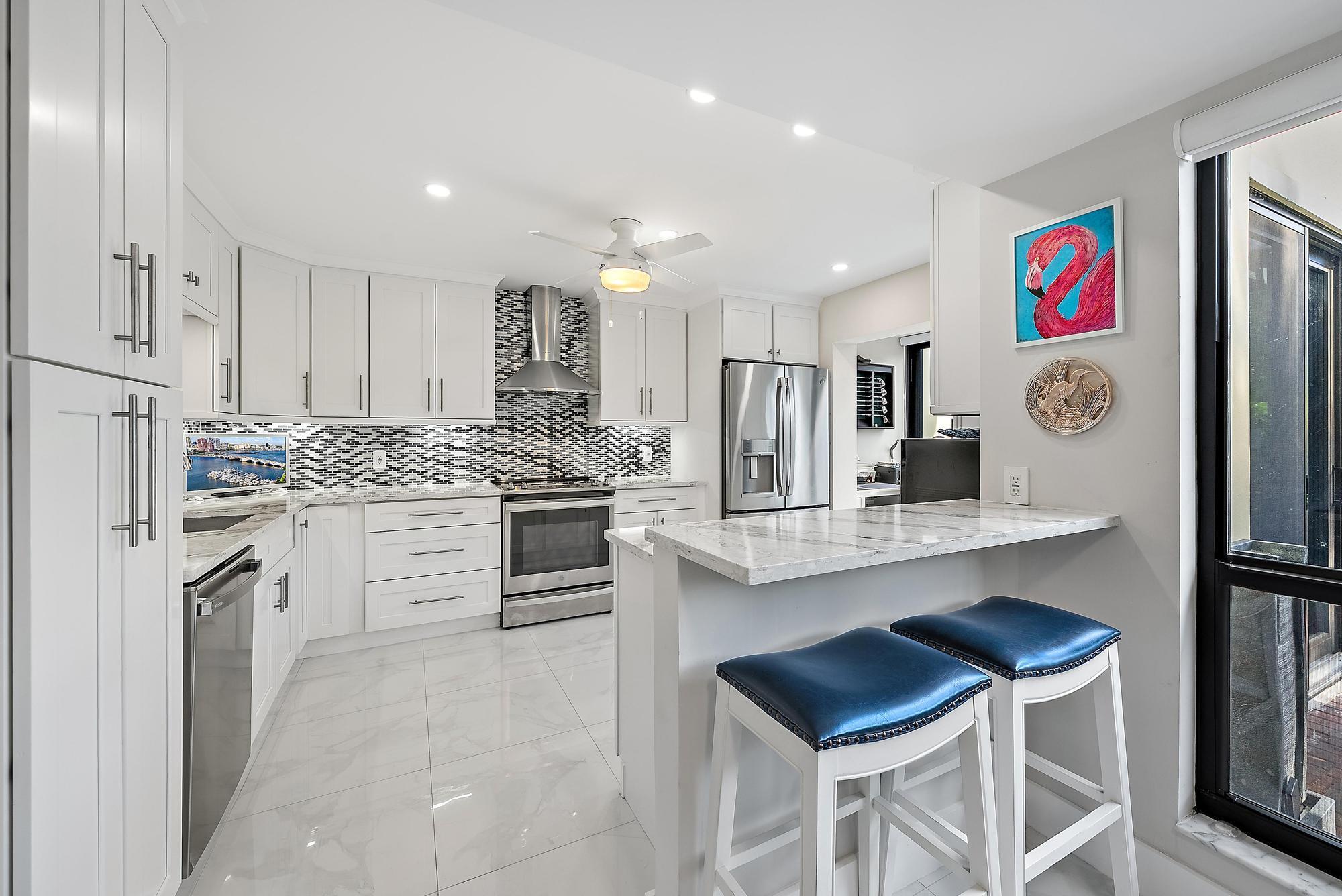 Foto de propiedad en 3693 Quail Ridge Drive Bobwhite B, Boynton Beach, FL 33436 Boynton Beach con MLS# 