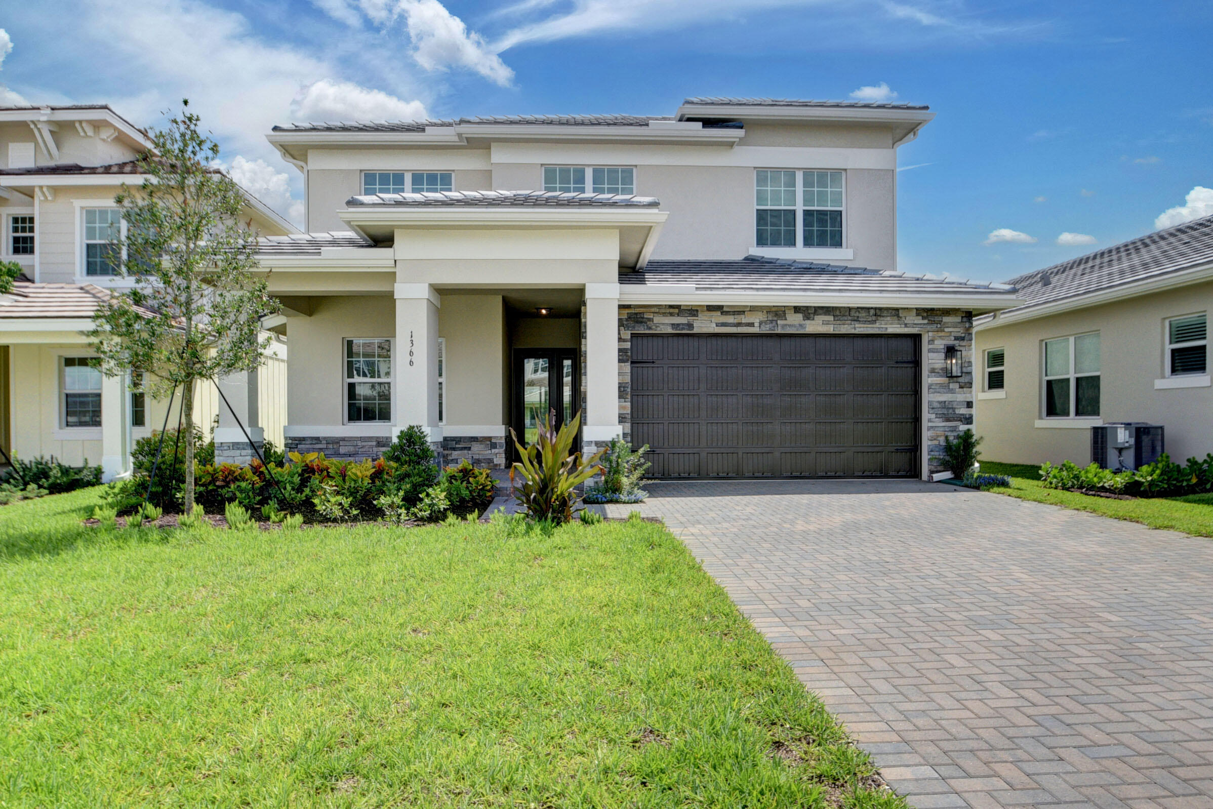 Foto de propiedad en 1366 Harvester Crossing, The Acreage, FL 33470 The Acreage con MLS# 