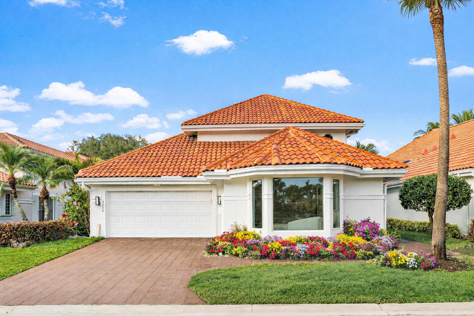 Foto de propiedad en 5239 Suffolk Drive, Boca Raton, FL 33496 Boca Raton con MLS# 