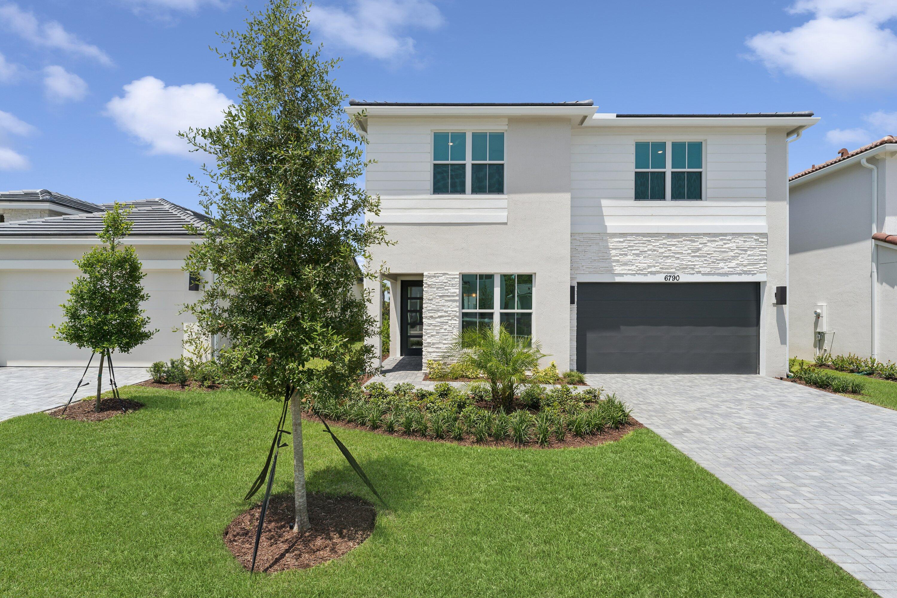Foto de propiedad en 6790 SE Lost Pine Drive 29, Stuart, FL 34997 Stuart con MLS# 
