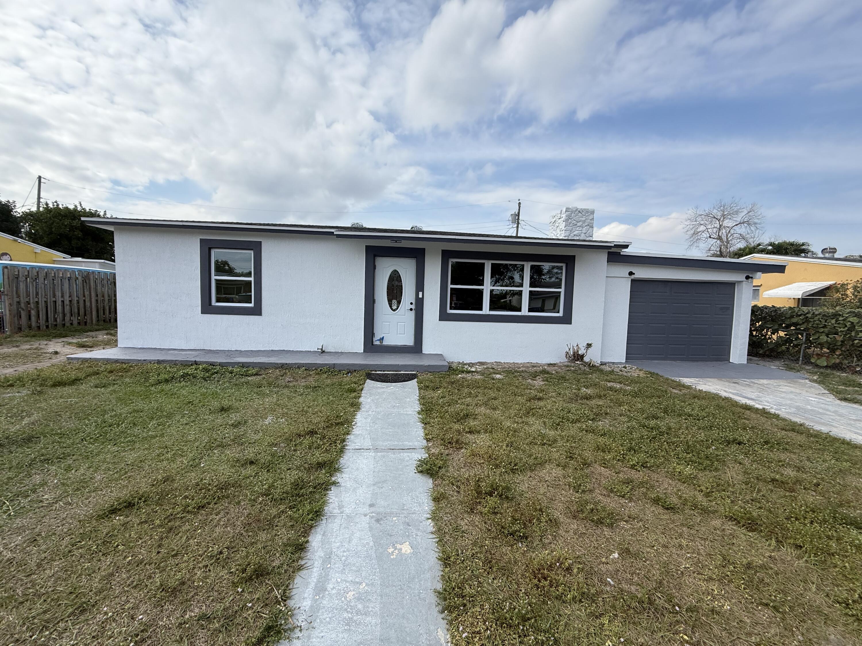 Foto de propiedad en 2353 S Beech Rd Road, West Palm Beach, FL 33409 West Palm Beach con MLS# 