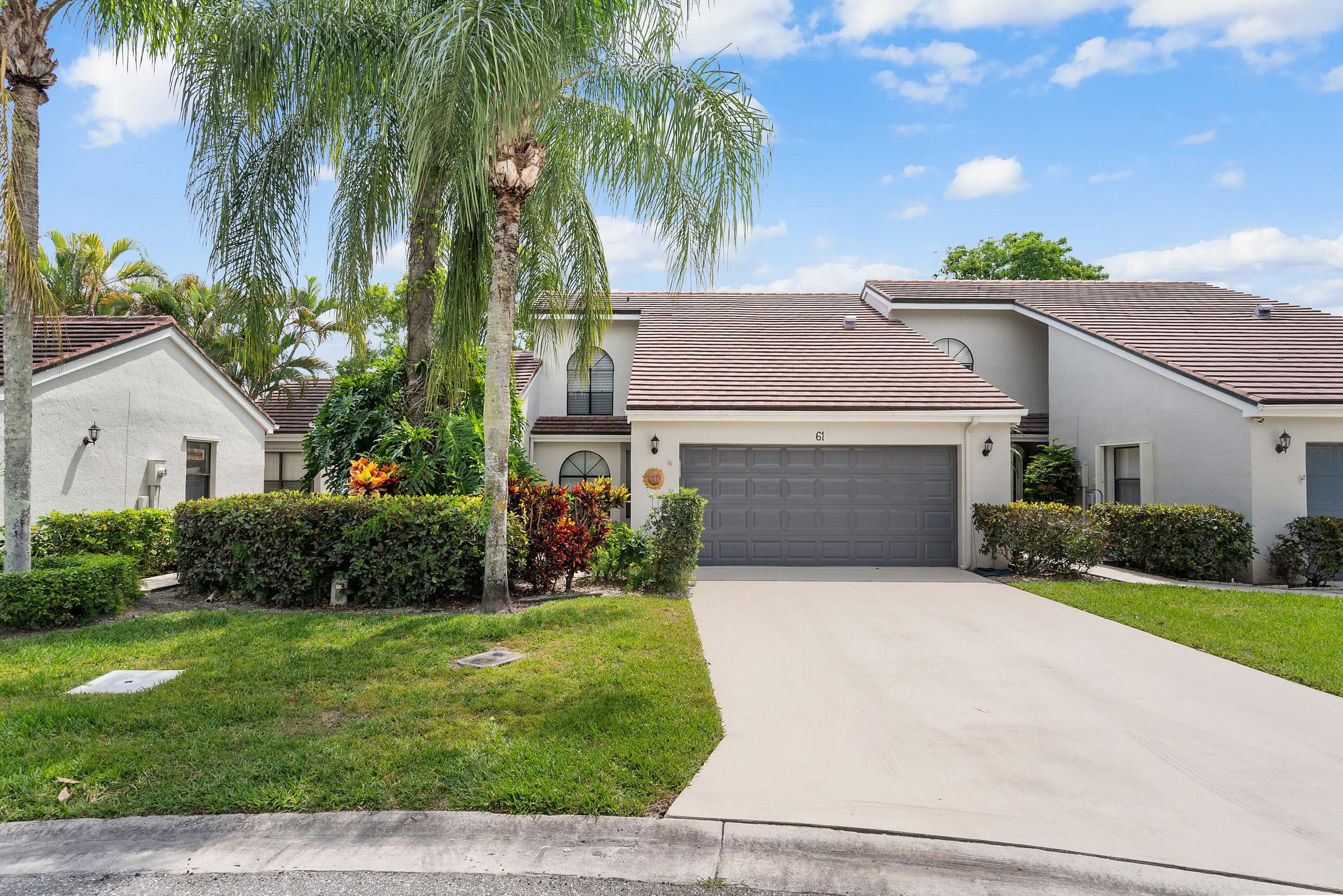 Foto de propiedad en 61 Edinburgh Drive, Palm Beach Gardens, FL 33418 Palm Beach Gardens con MLS# 