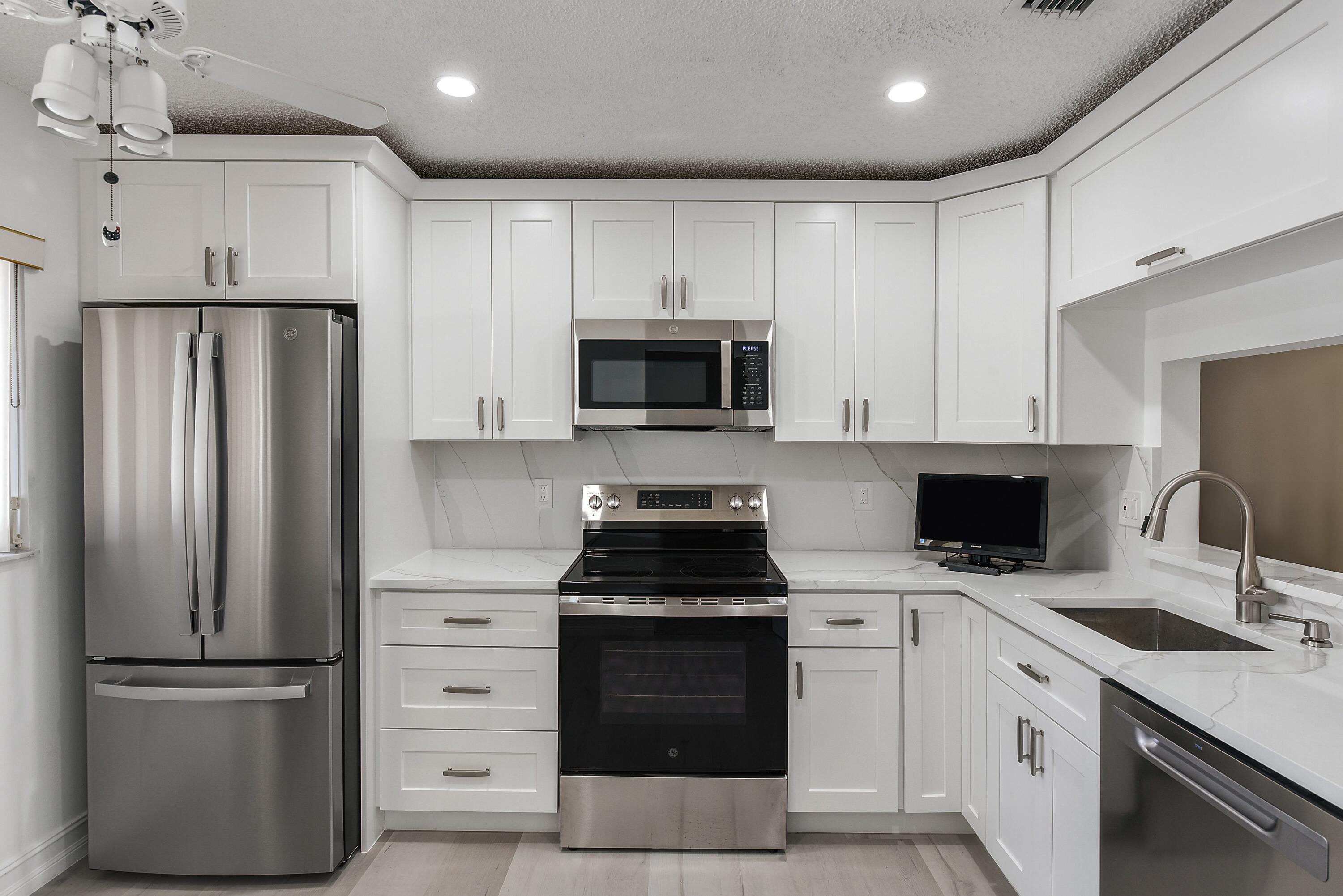 Foto de propiedad en 15342 Lakes Of Delray Boulevard 98, Delray Beach, FL 33484 Delray Beach con MLS# 