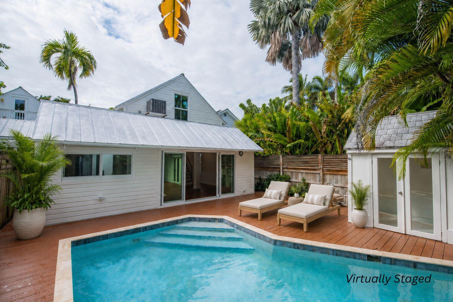 Classic 3 bedroom 2.5 bath home in Old Town Key West with a pool , spa and pool house. (Virtually Staged)