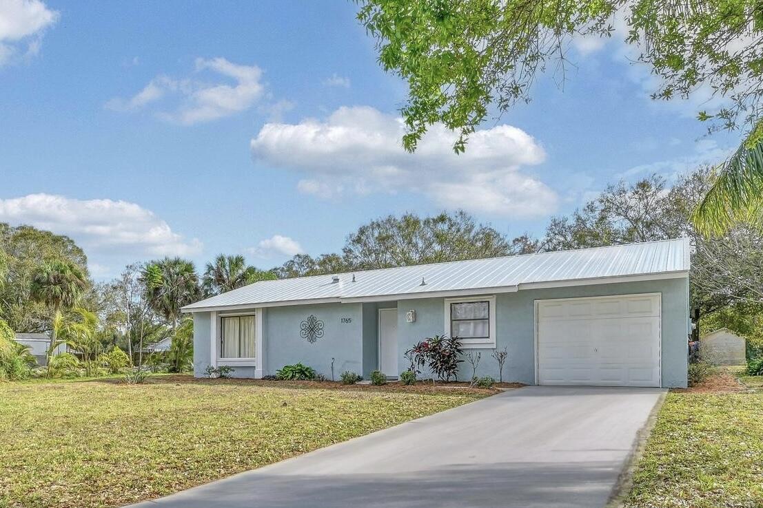 Foto de propiedad en 1765 24th Place SW, Vero Beach, FL 32962 Vero Beach con MLS# 