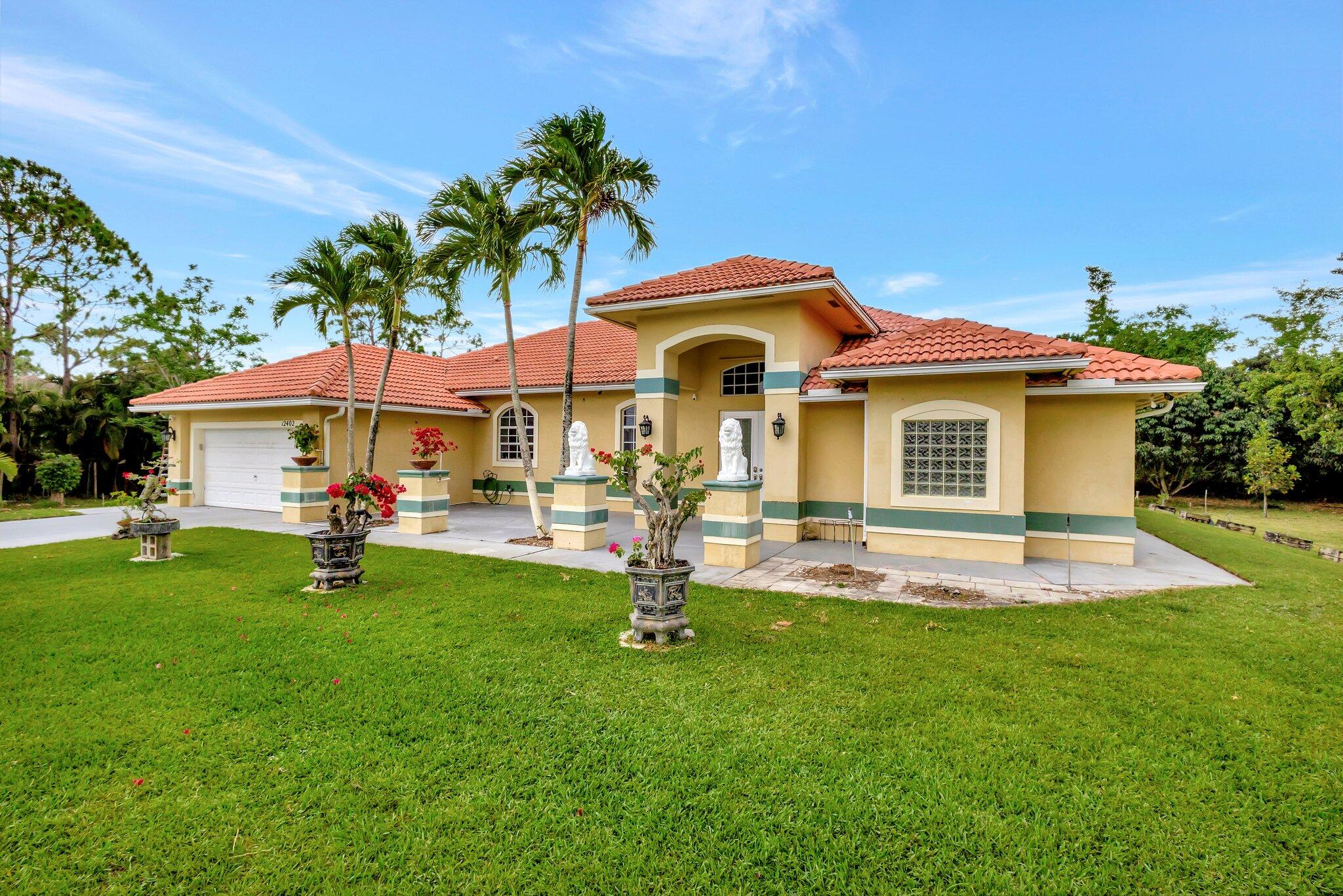 Foto de propiedad en 12402 83rd Lane N, The Acreage, FL 33412 The Acreage con MLS# 
