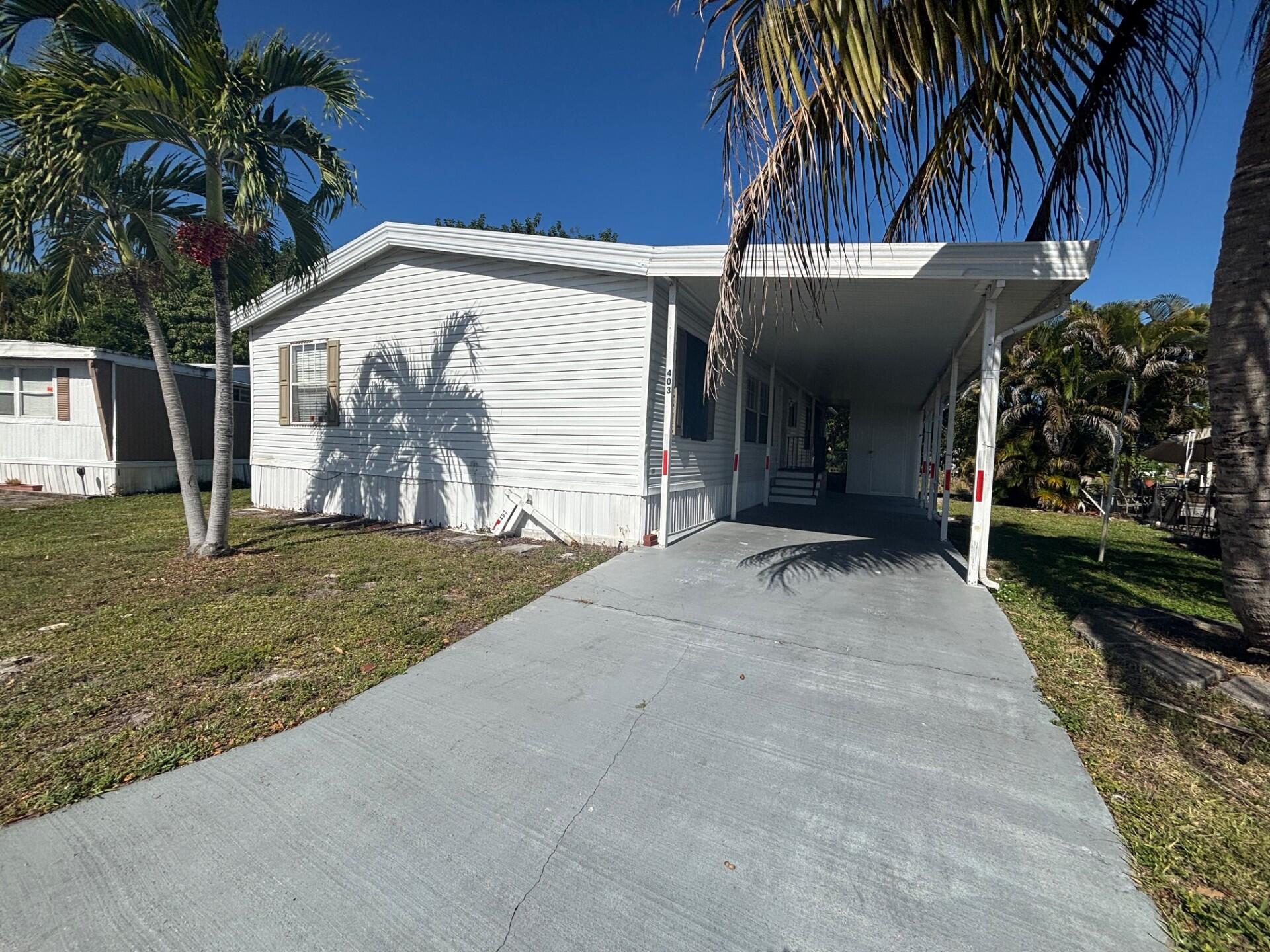 Foto de propiedad en 403 NW 50th Ct, Lot# 1415, Deerfield Beach, FL 33064 Deerfield Beach con MLS# 