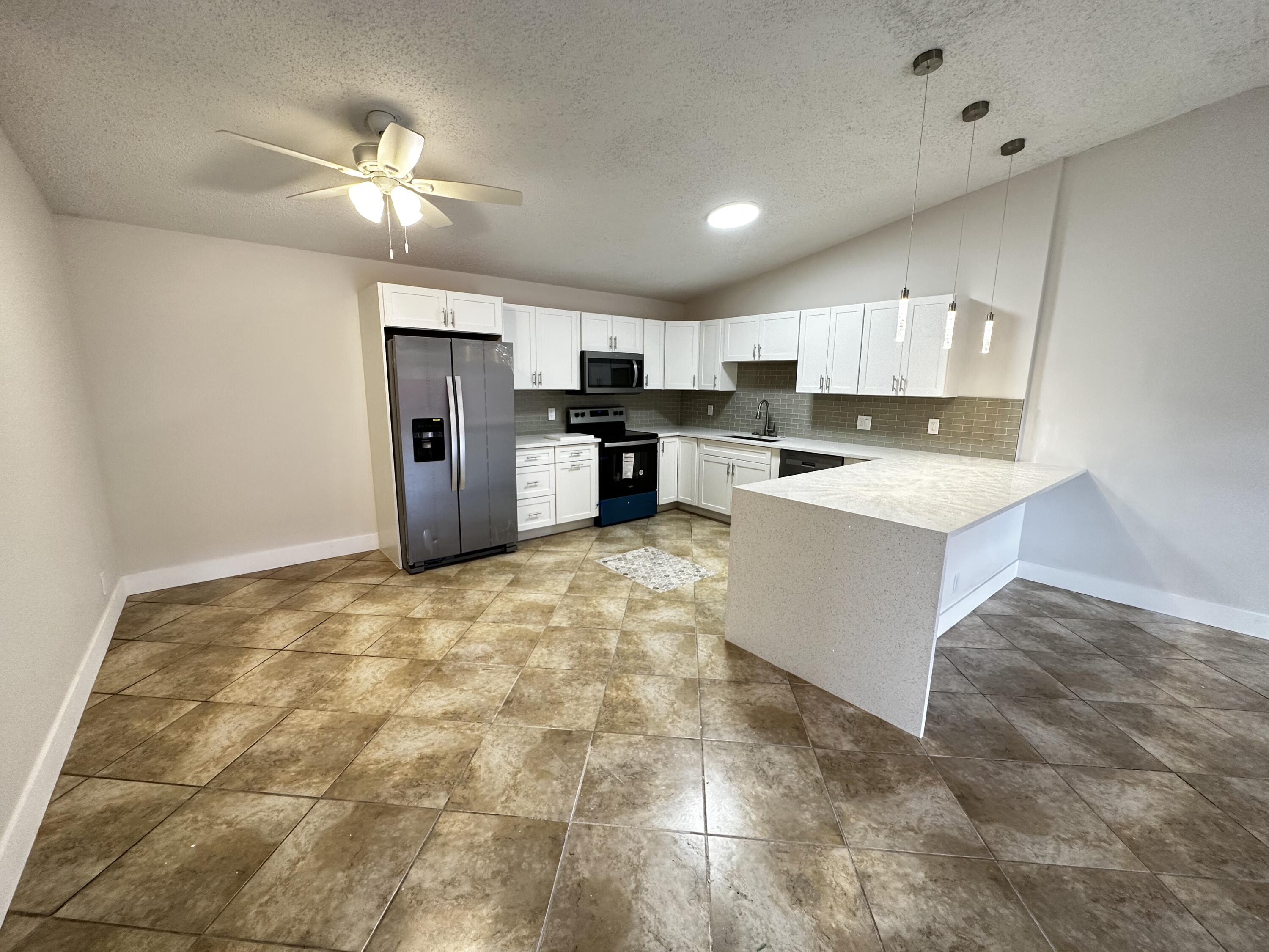 Foto de propiedad en 4326 Woodstock Drive C, West Palm Beach, FL 33409 West Palm Beach con MLS# 