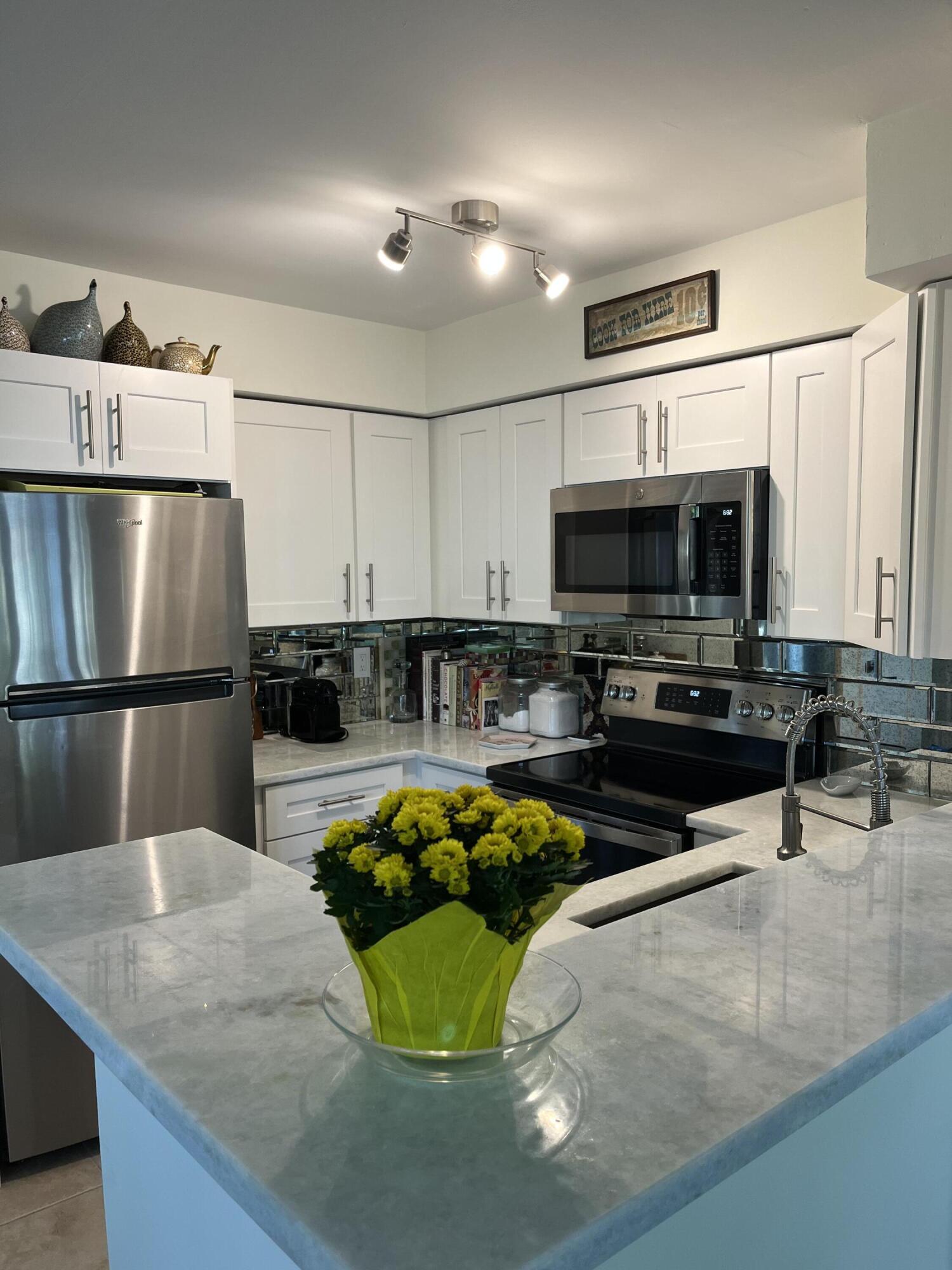 Foto de propiedad en 1001 Crystal Way A, Delray Beach, FL 33444 Delray Beach con MLS# 