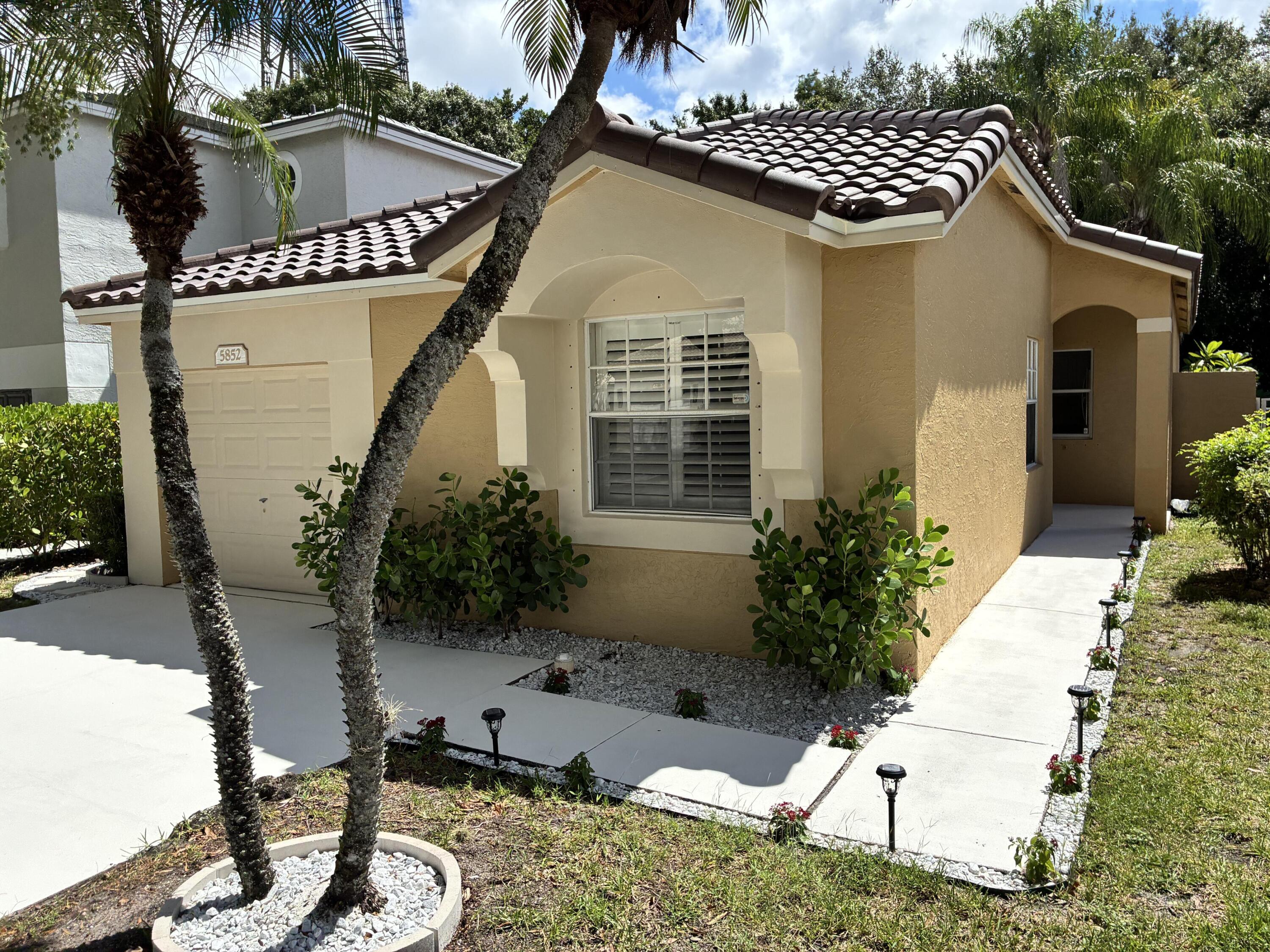Foto de propiedad en 5852 Eagle Cay Terrace, Coconut Creek, FL 33073 Coconut Creek con MLS# 