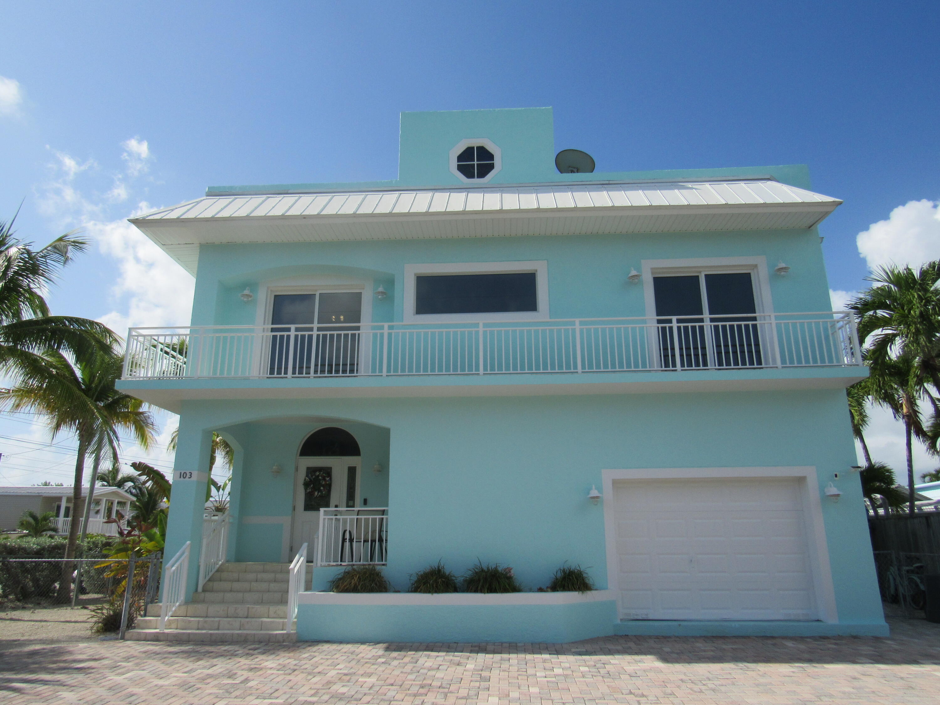 Foto de propiedad en 103 Starfish Lane, Tavernier, FL 33070 Tavernier con MLS# 